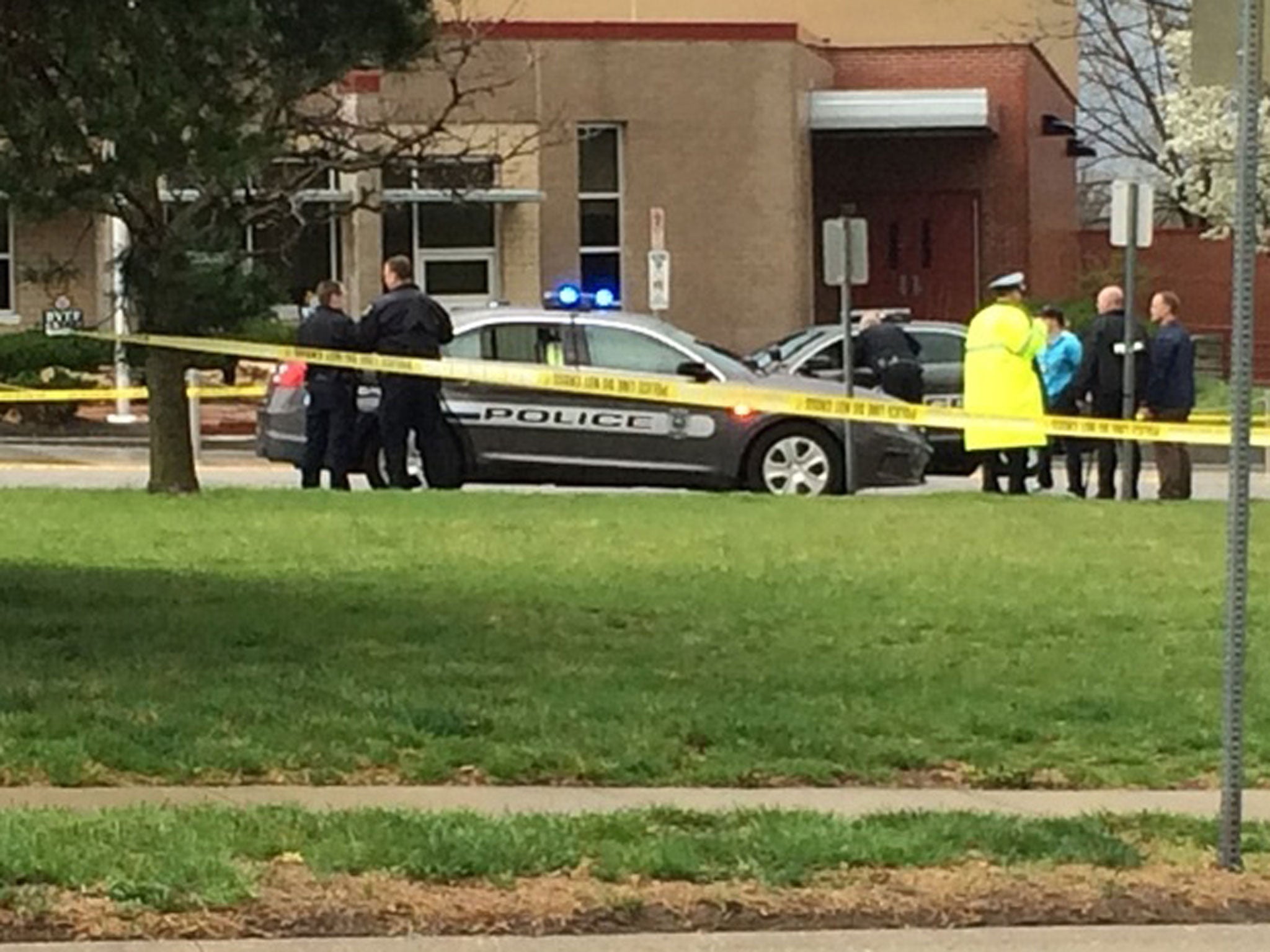 Authorities respond to the Jewish community center after a shooting in Overland Park