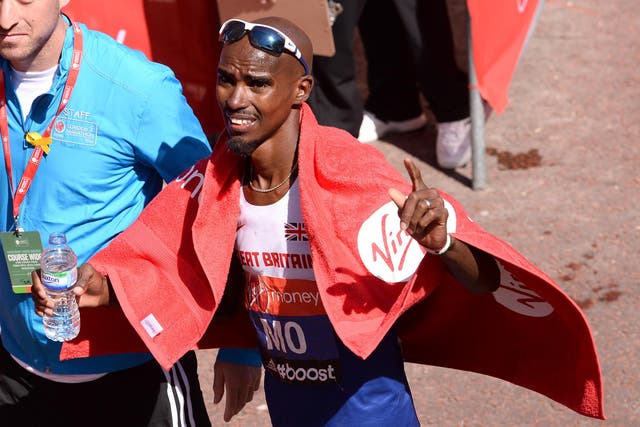 Mo Farah salutes the crowd after his London Marathon debut