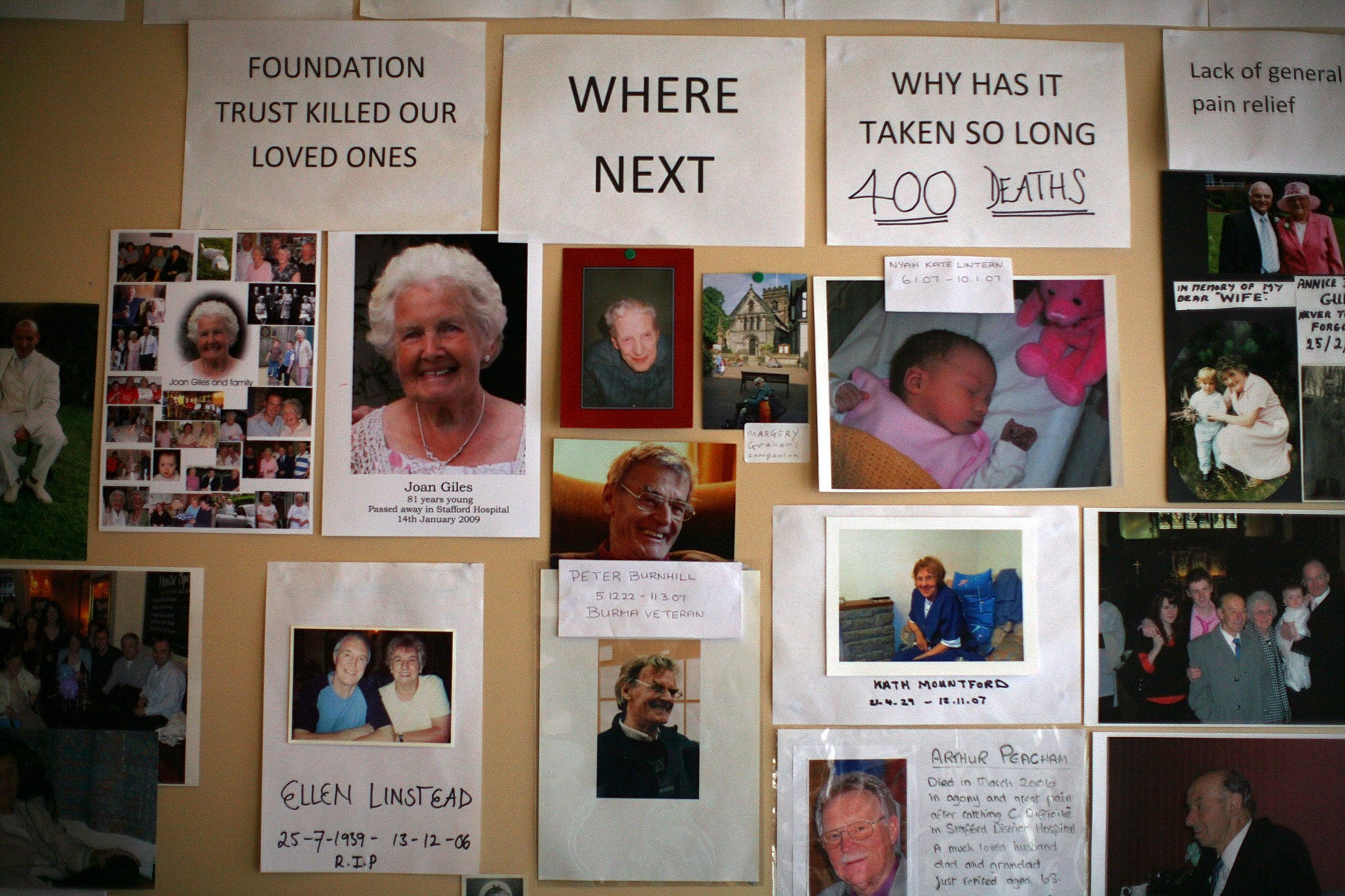 A memorial gallery of patients who died at Stafford General Hospital is affixed on the wall at the headquarters of campaign group Cure the NHS on March 17, 2009