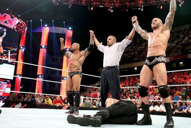 Batista, Triple H and Randy Orton reunite as Evolution to take down The Shield