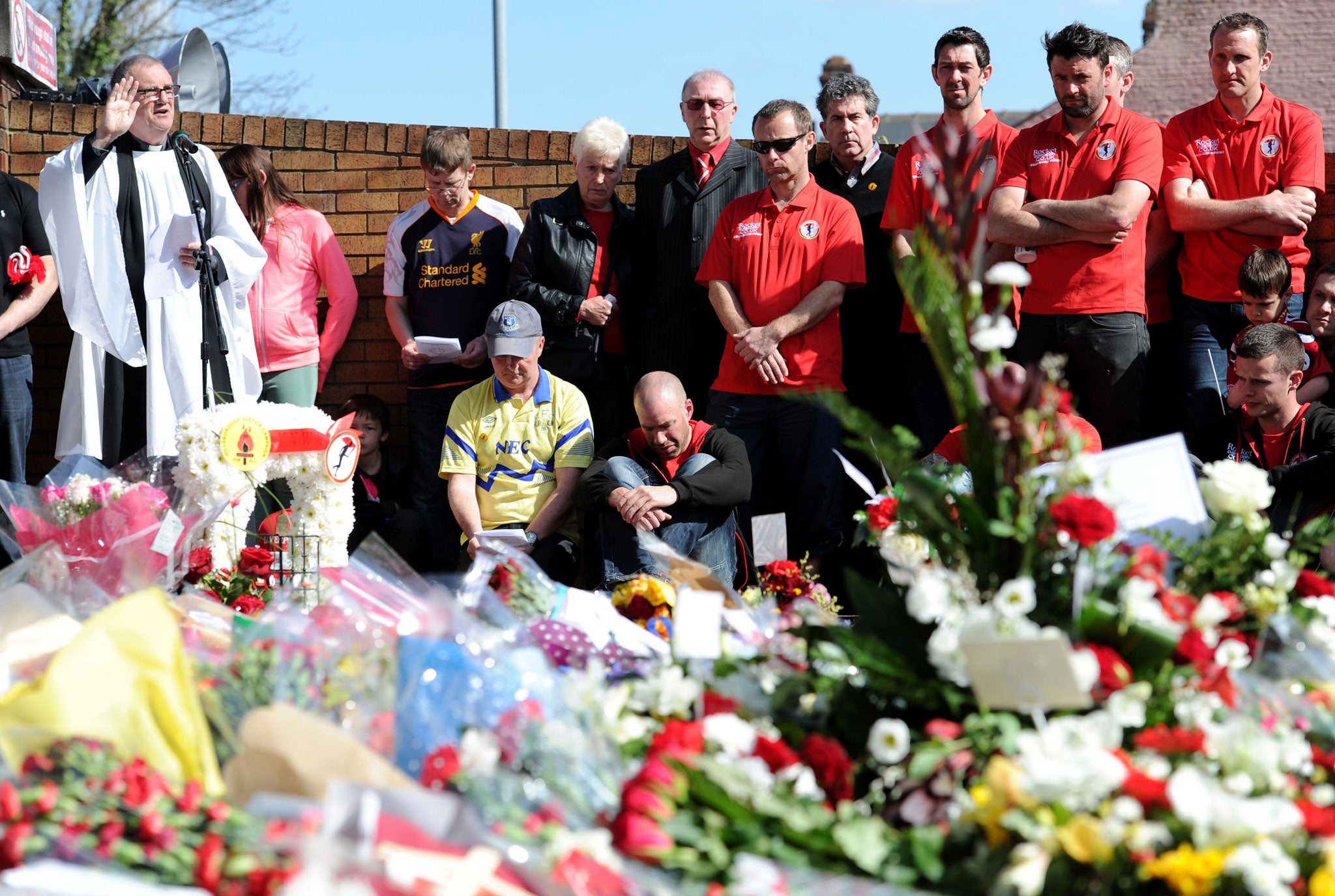 Members of the public and football fans gather together during the Hillsborough 25th Anniversary Memorial Service at Hillsborough, Sheffield