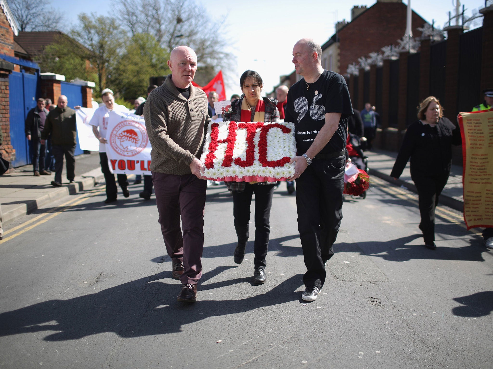 Members of the Hillsborough Justice Campaign group march to Anfield for a memorial service marking the 25th anniversary of the Hillsborough Disaster at Anfield stadium in Liverpool
