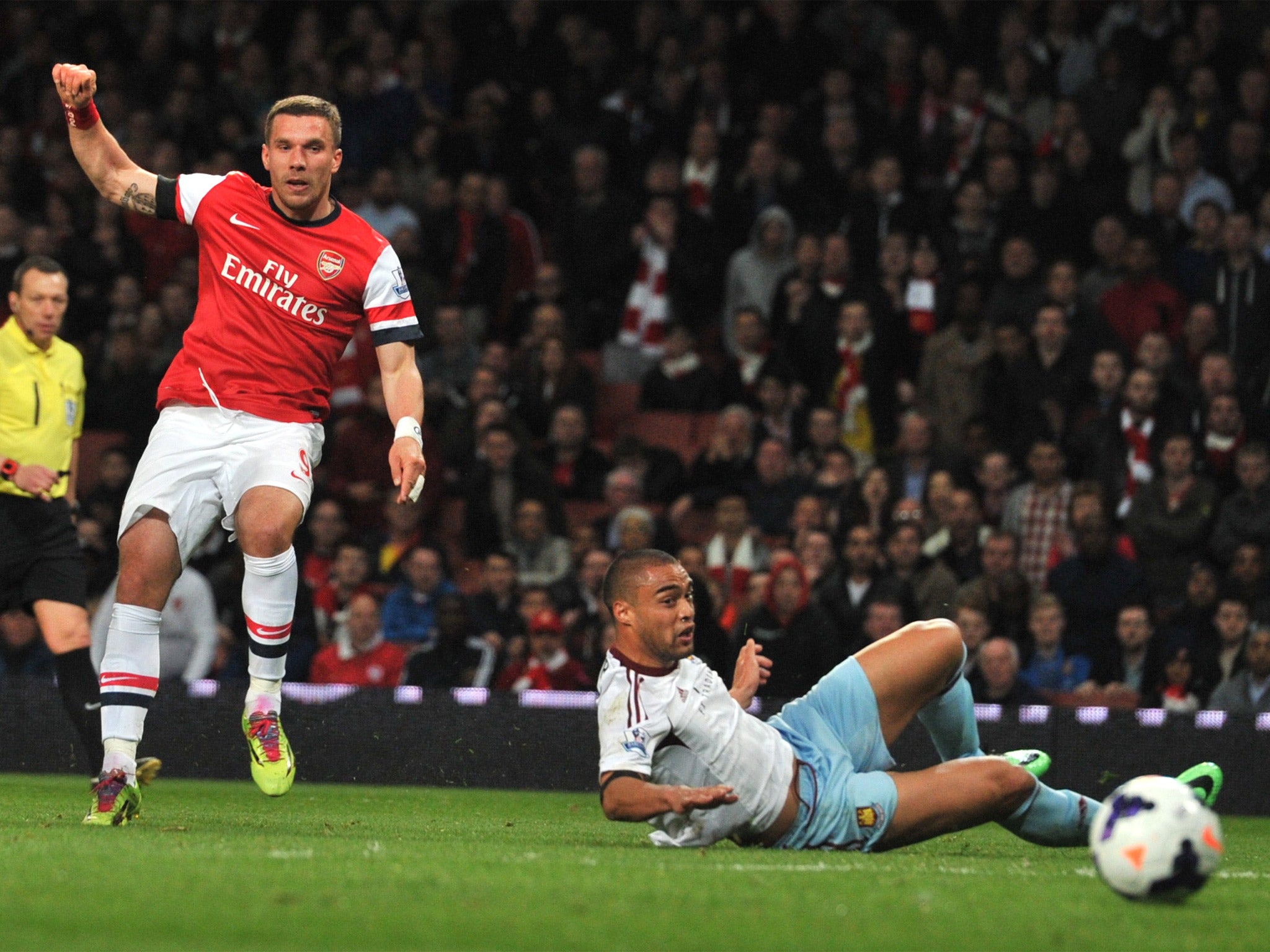 Lukas Podolski equalises with a precise, powerful finish