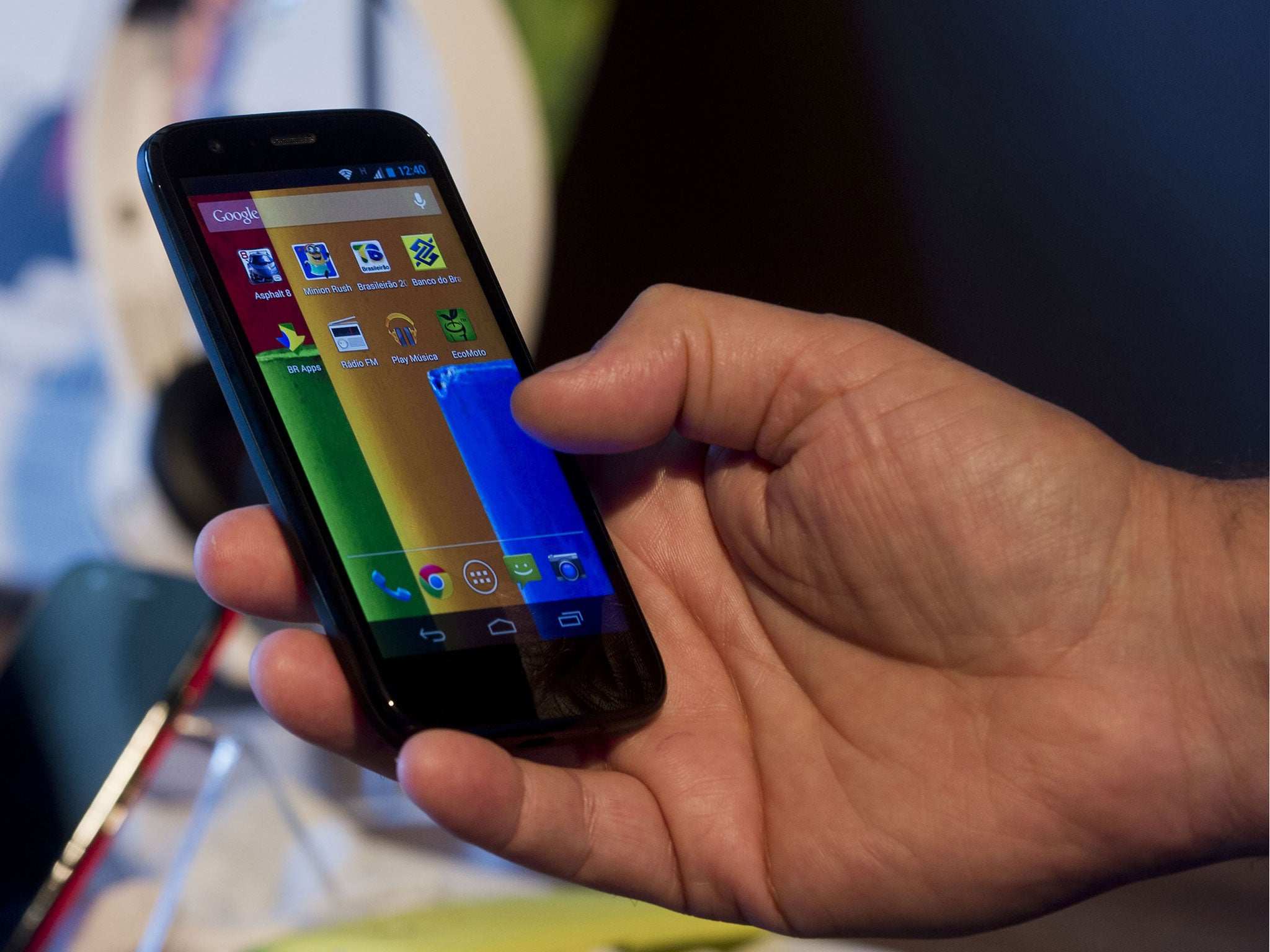 The new low cost smartphone of Motorola, 'Motorola Moto G', is displayed in Sao Paulo, Brazil on November 13, 2013. The smartphone, with dimensions 65.9mm W x 129.9mm H x 6.0 - 11.6mm D is equipped with a Qualcomm Snapdragon 400 with quad-core 1,2 GHz CPU