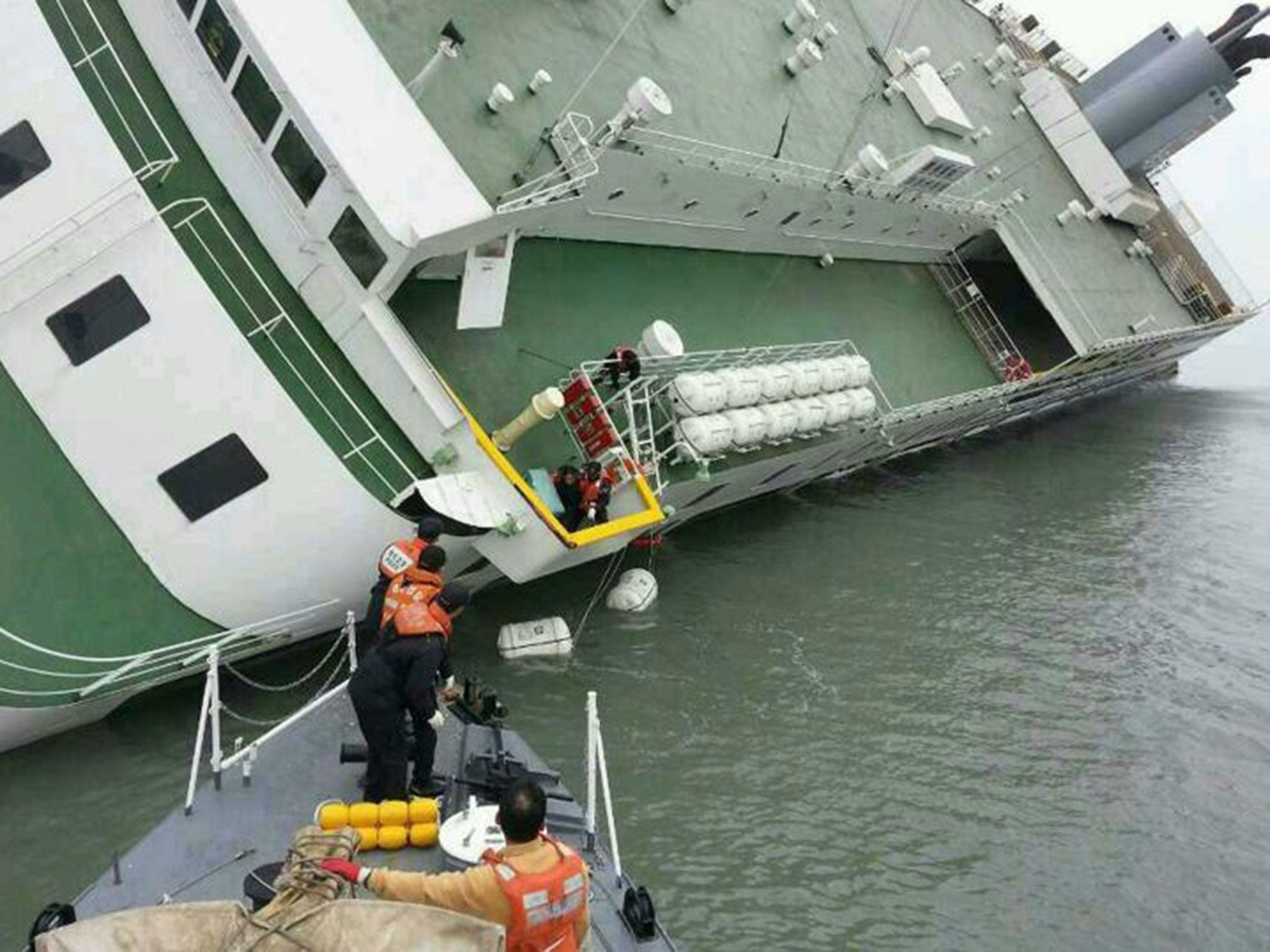 South Korea coast guard head to stricken passengers aboard the sinking ship