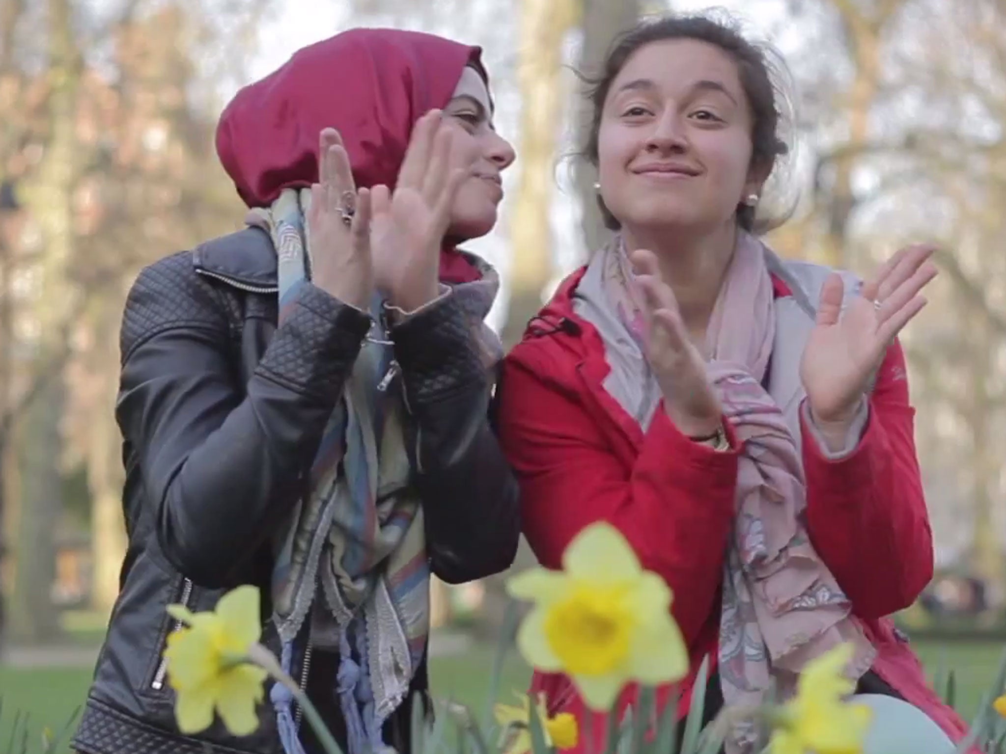 Two young British Muslims dance in The Honesty Policy's 'Happy' video