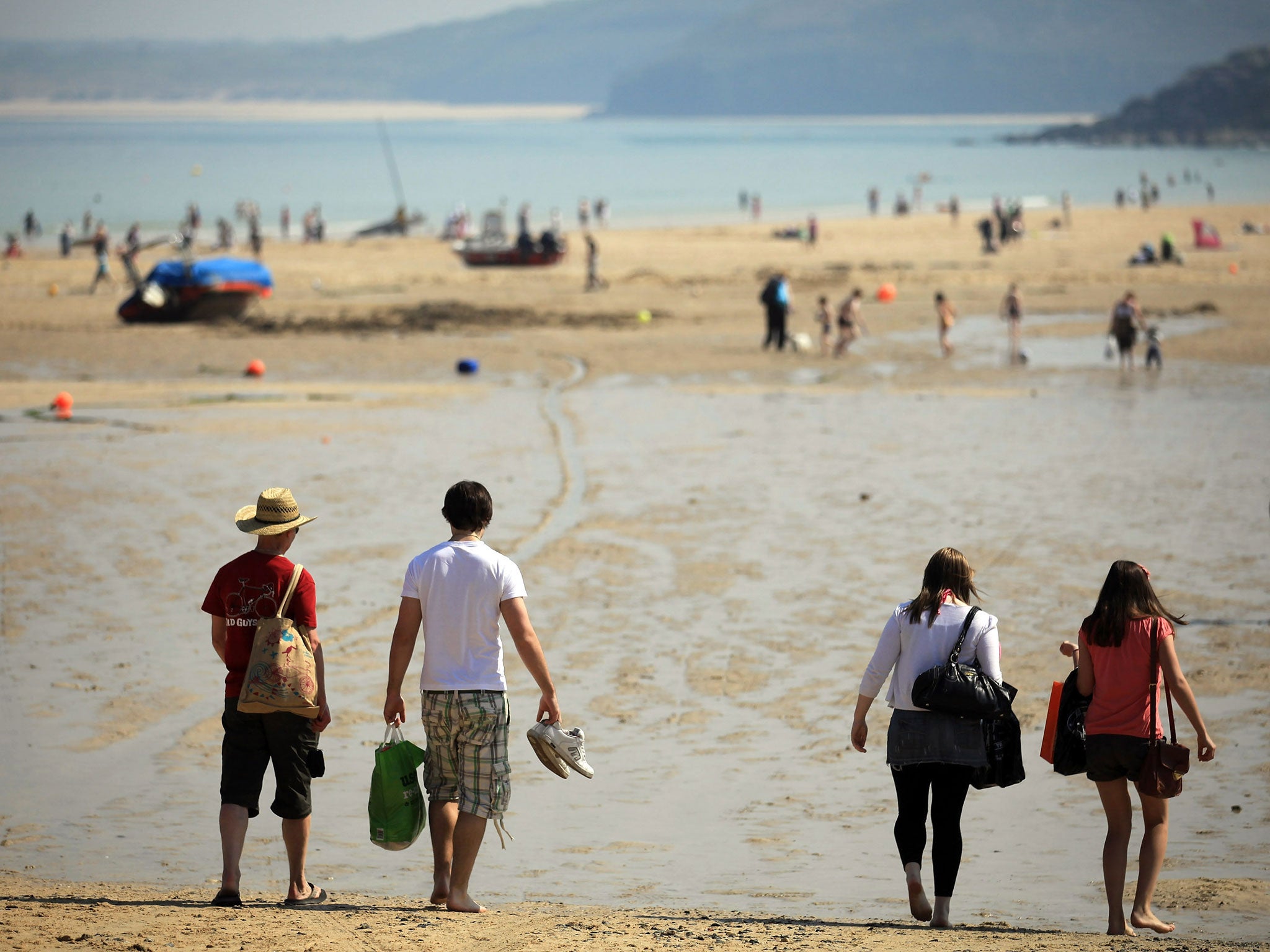 People enjoy the fine weather on an Easter weekend in St Ives, Cornwall