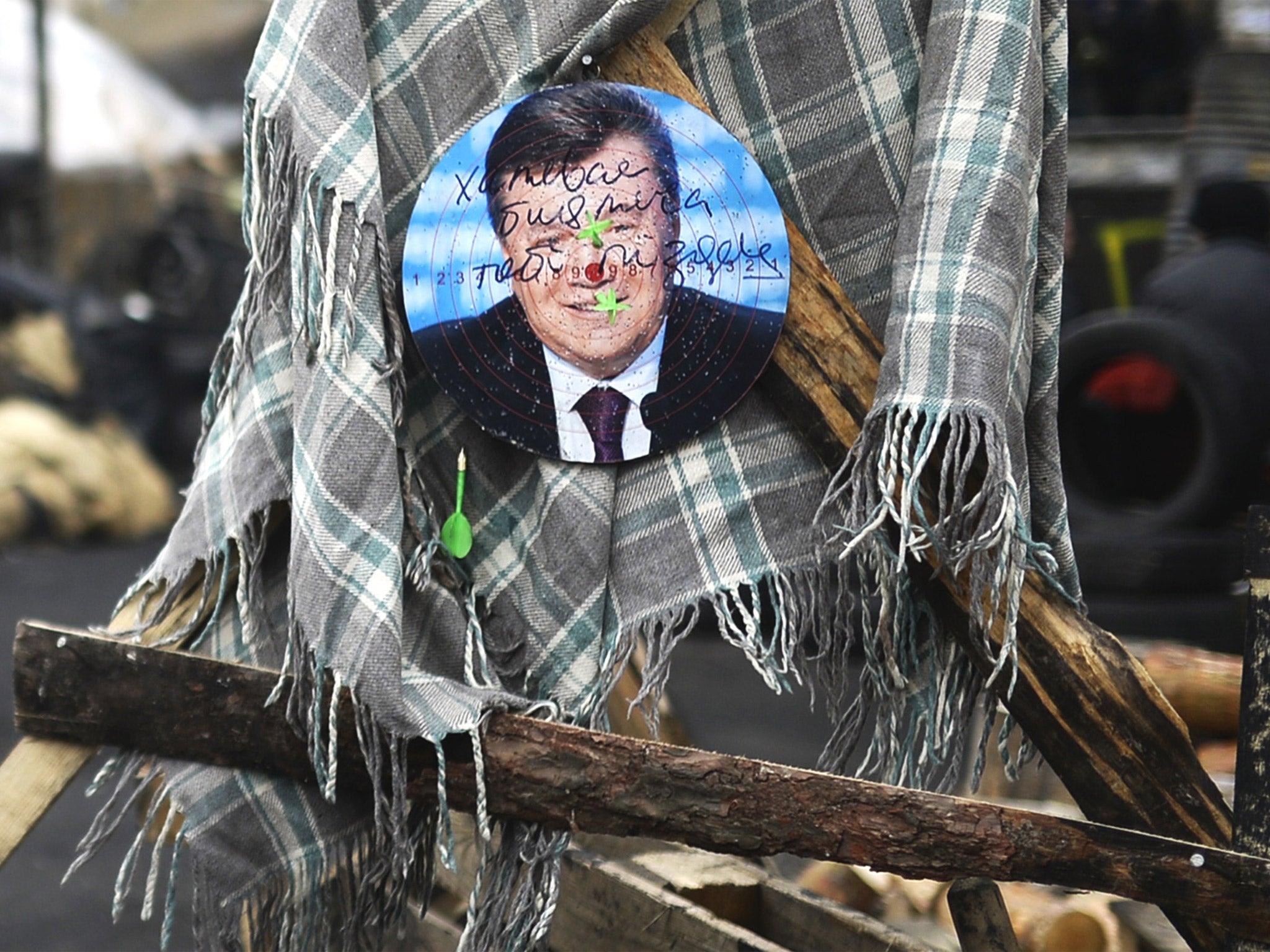 A picture of the ousted Ukrainian President, Viktor Yanukovych, on a dart board in Kiev