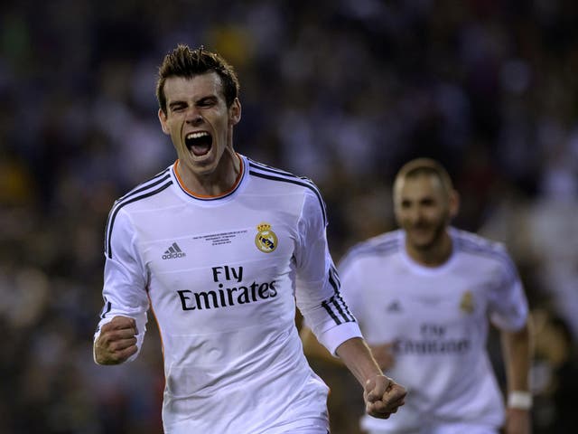 Gareth Bale celebrates his winning goal in the 2-1 Copa del Rey final victory over Barcelona in the Champions League final
