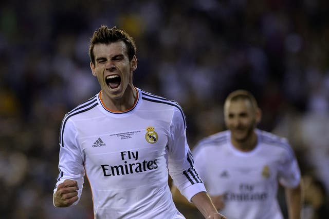 Gareth Bale celebrates his winning goal in the 2-1 Copa del Rey final victory over Barcelona in the Champions League final