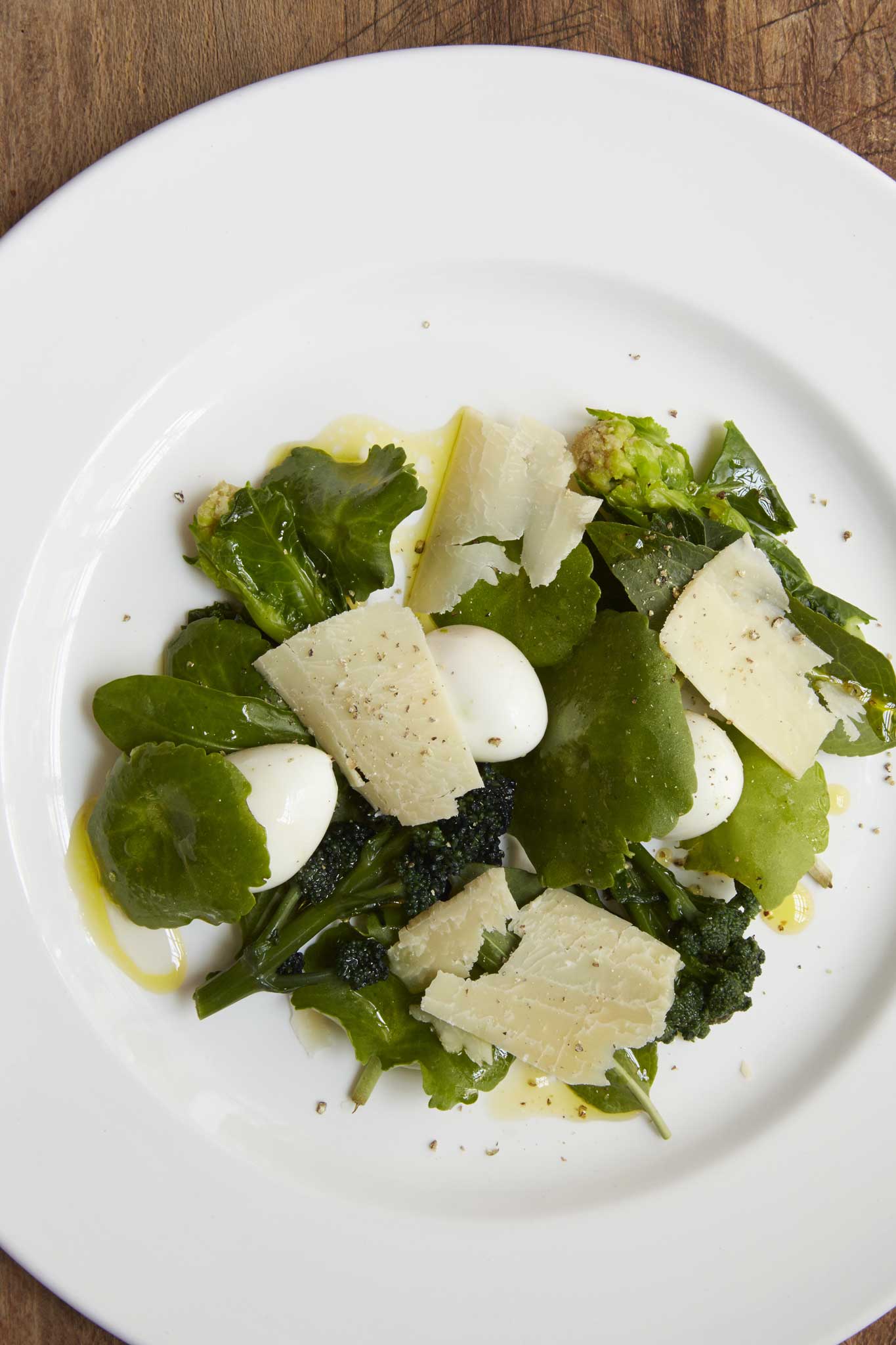 Sprouting broccoli and quail's egg salad with shaved Berkswell cheese (Jason Lowe)