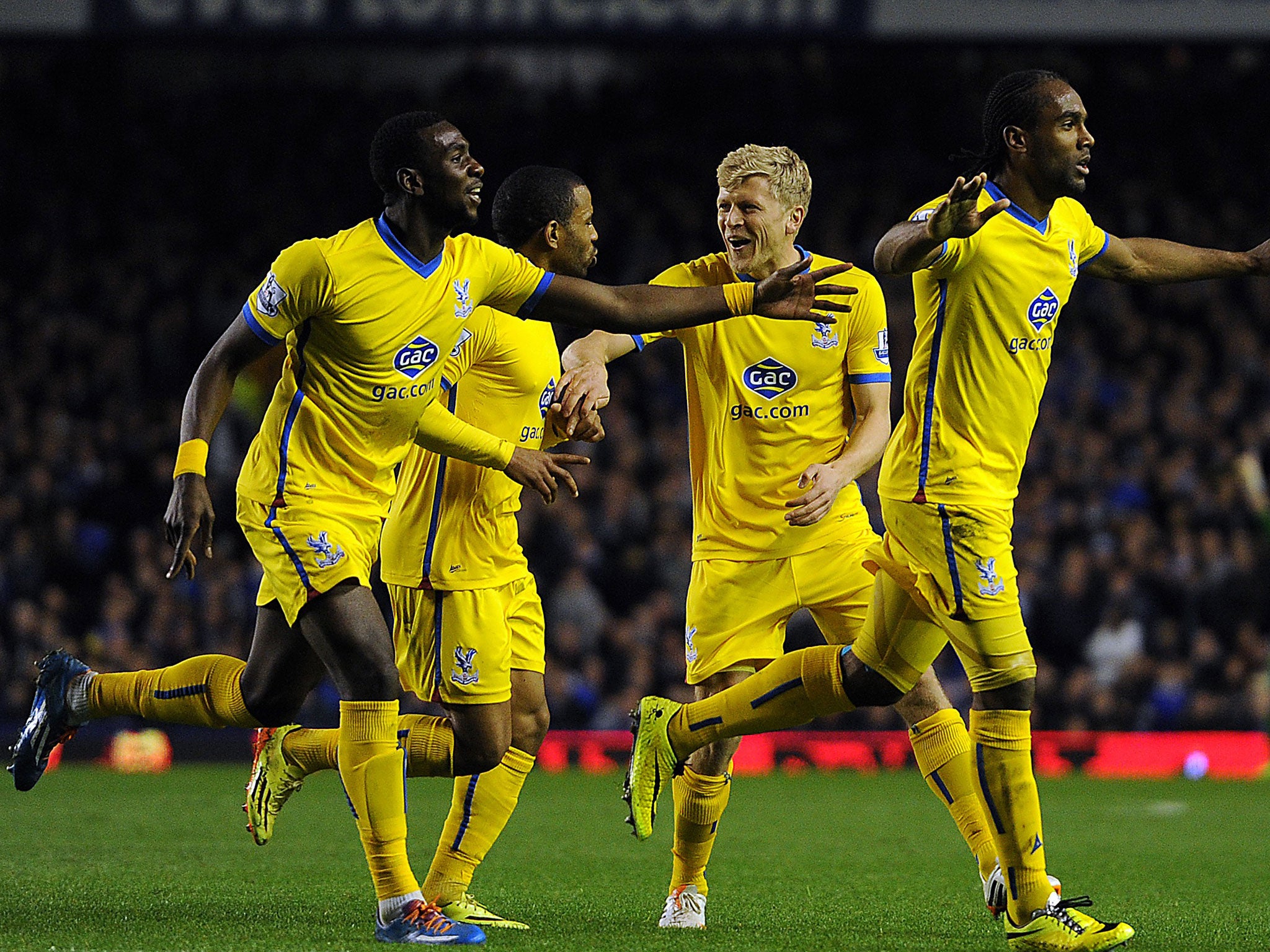 Cameron Jerome (far right) celebrates scoring Palace’s third goal against Everton on Wednesday
