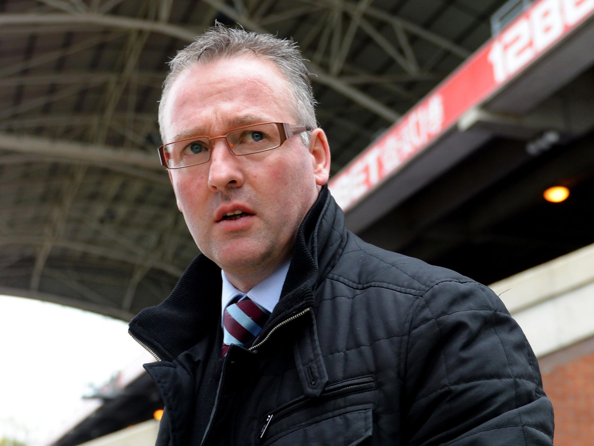 Paul Lambert looks on from the dugout