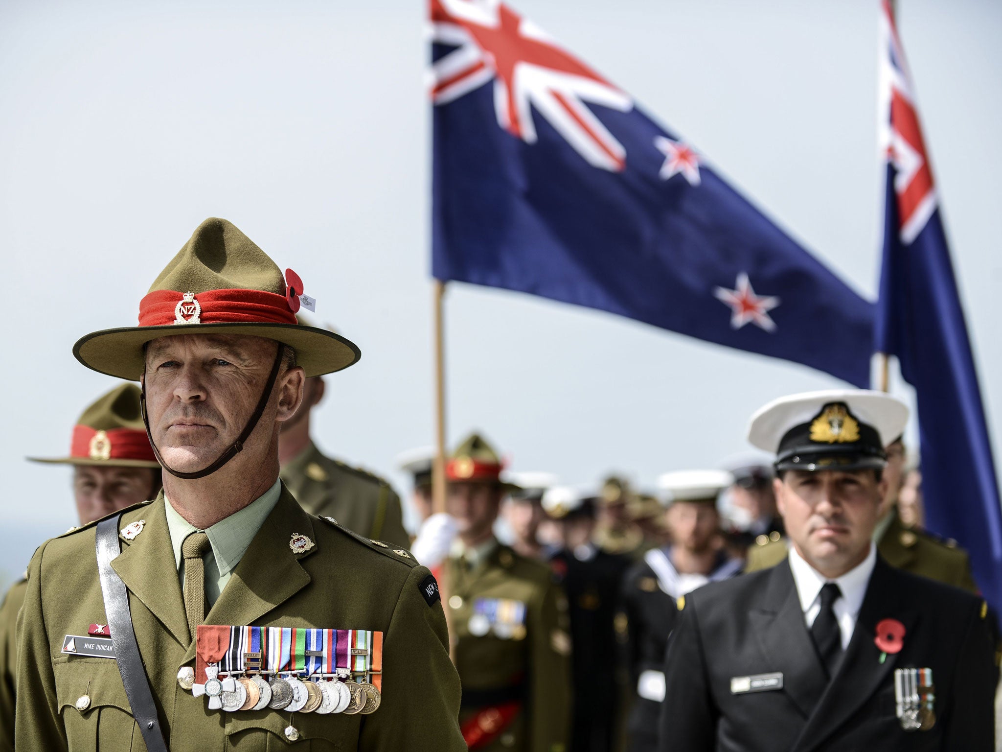 Australian and New Zealand soldiers take stand during the ceremony celebrating the 99th anniversary of the Anzac Day in 2014