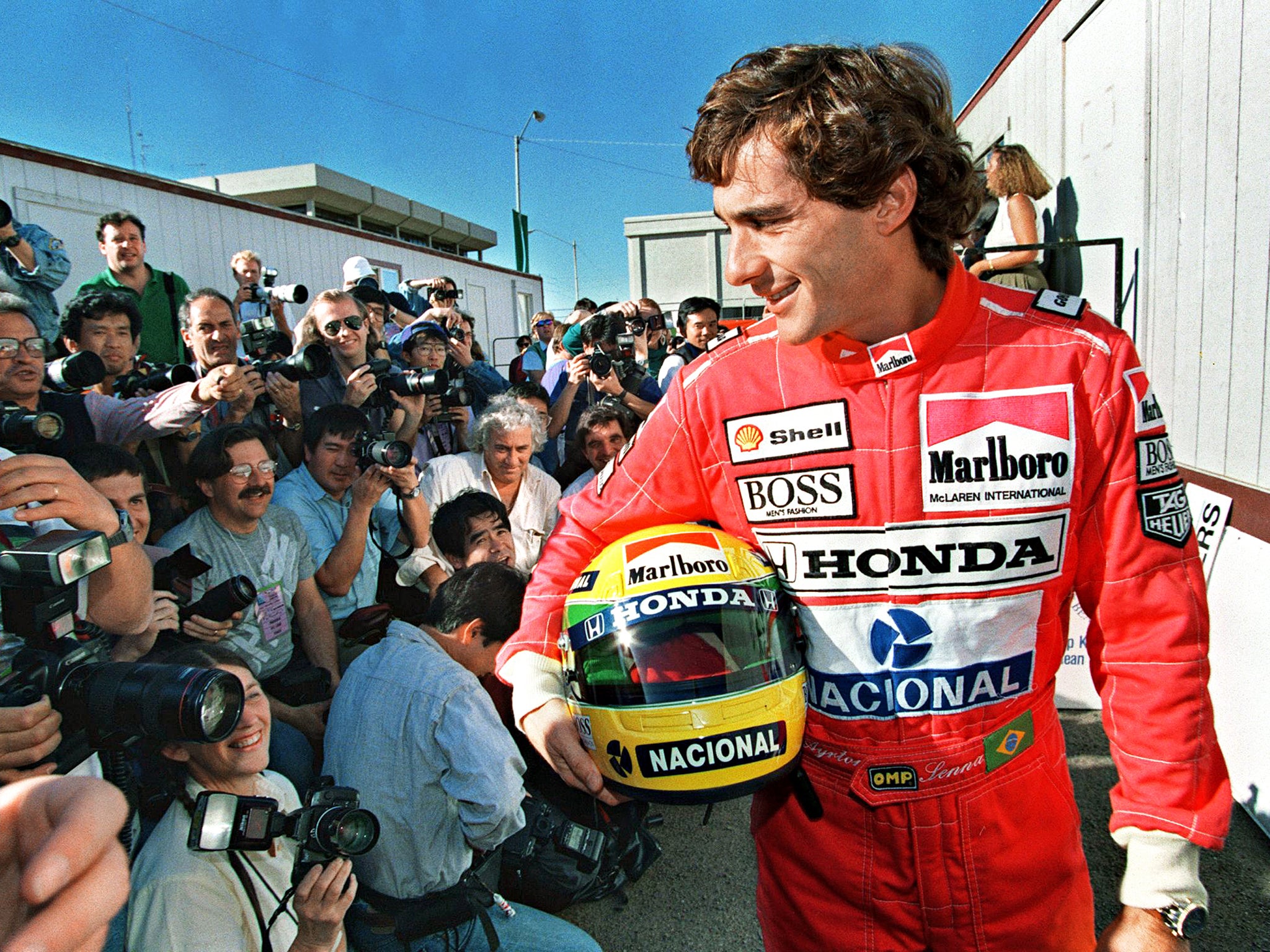 Ayrton Senna, the defending champion, poses for photographers in Phoenix on the eve of the 1991 F1 season