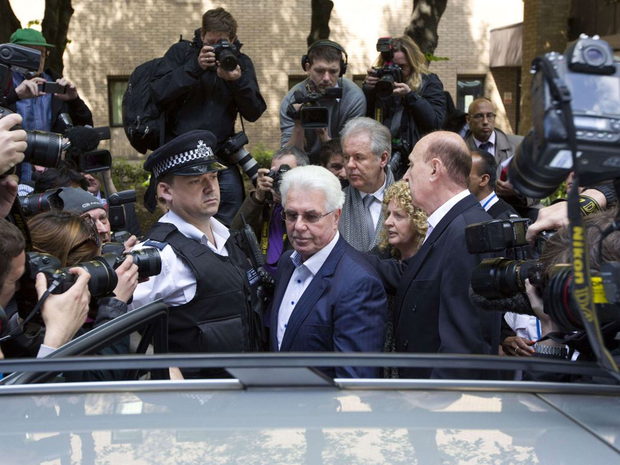 Max Clifford remained silent when he left Southwark Crown Court
