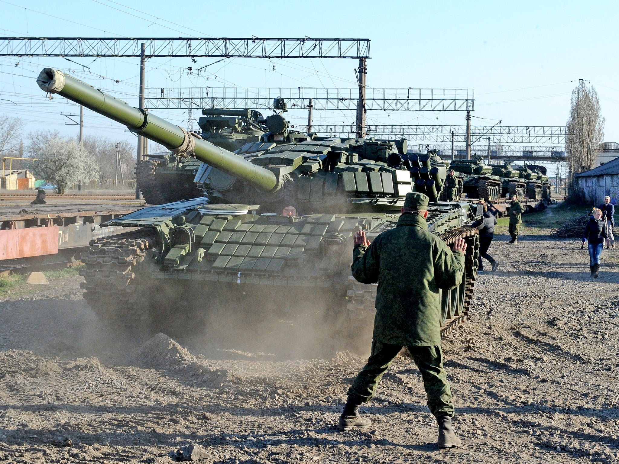 Russian troops are pictured in Crimea, which Putin annexed from Ukraine early in 2014