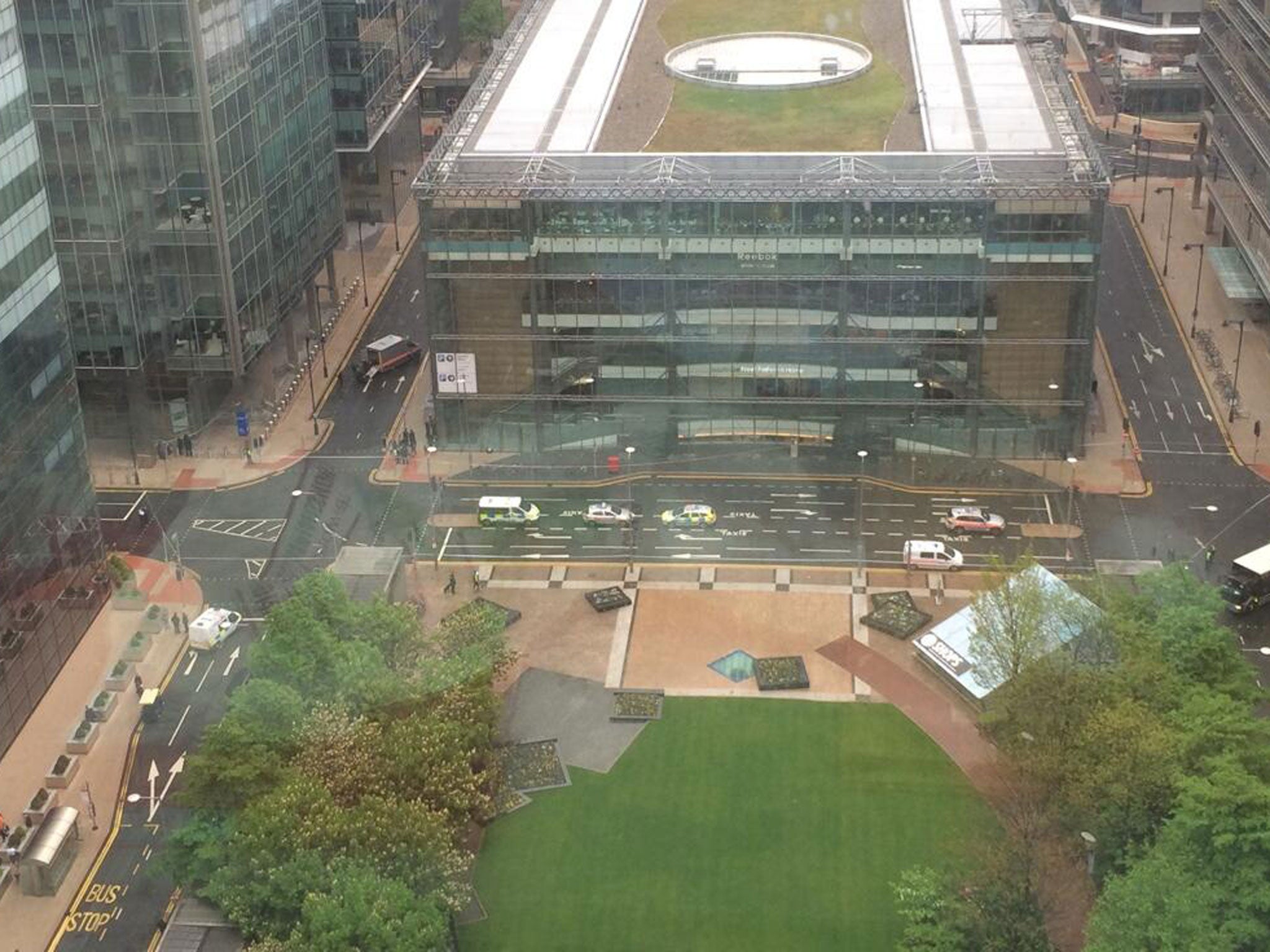 Police cordoned off Canary Wharf where a controlled explosion took place following reports of a 'suspicious package'
