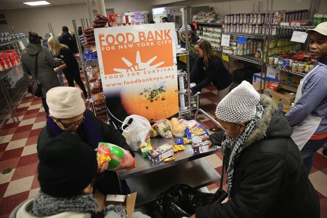 Modern history: residents at a food bank in New York