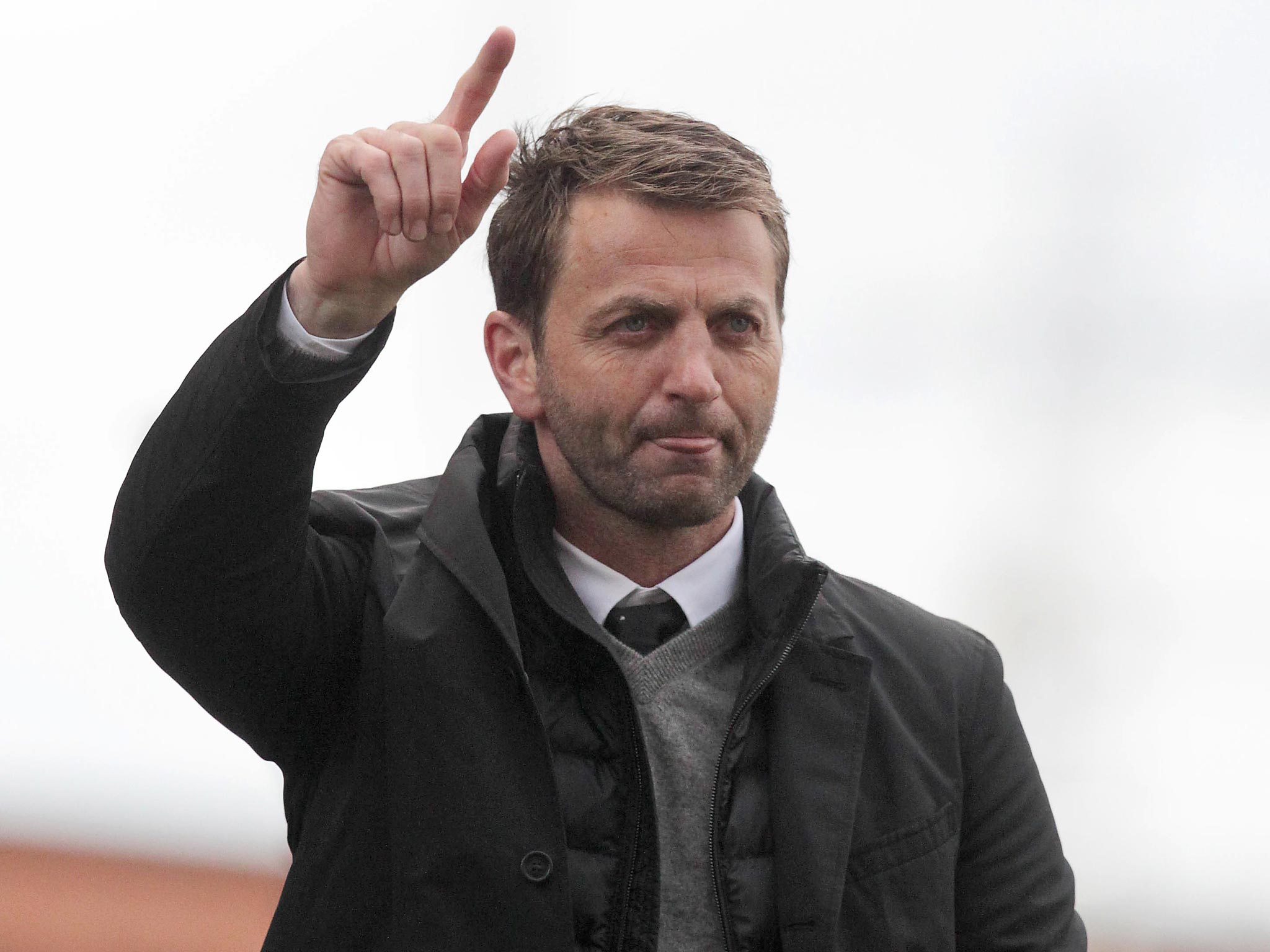Tim Sherwood raises his hand after the 1-0 victory over Stoke