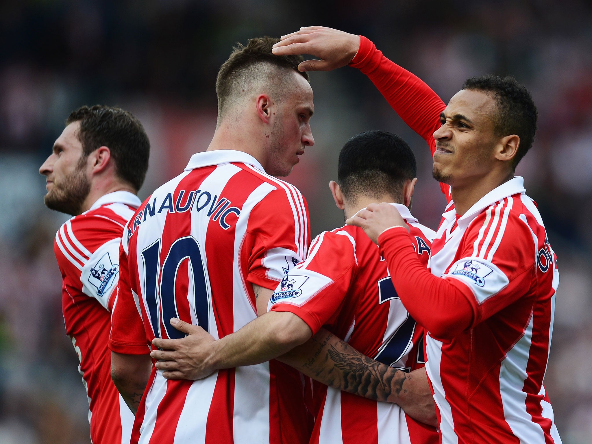 Stoke players celebrate after Peter Odemwingie's opening goal