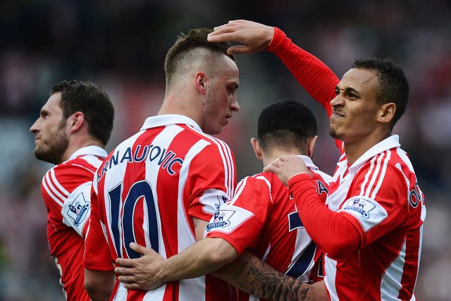 Stoke players celebrate after Peter Odemwingie's opening goal