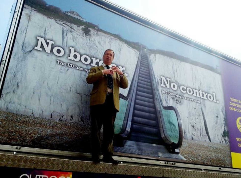 Cliffhanger: Nigel Farage launches Ukip’s poster on the cliffs in Dover