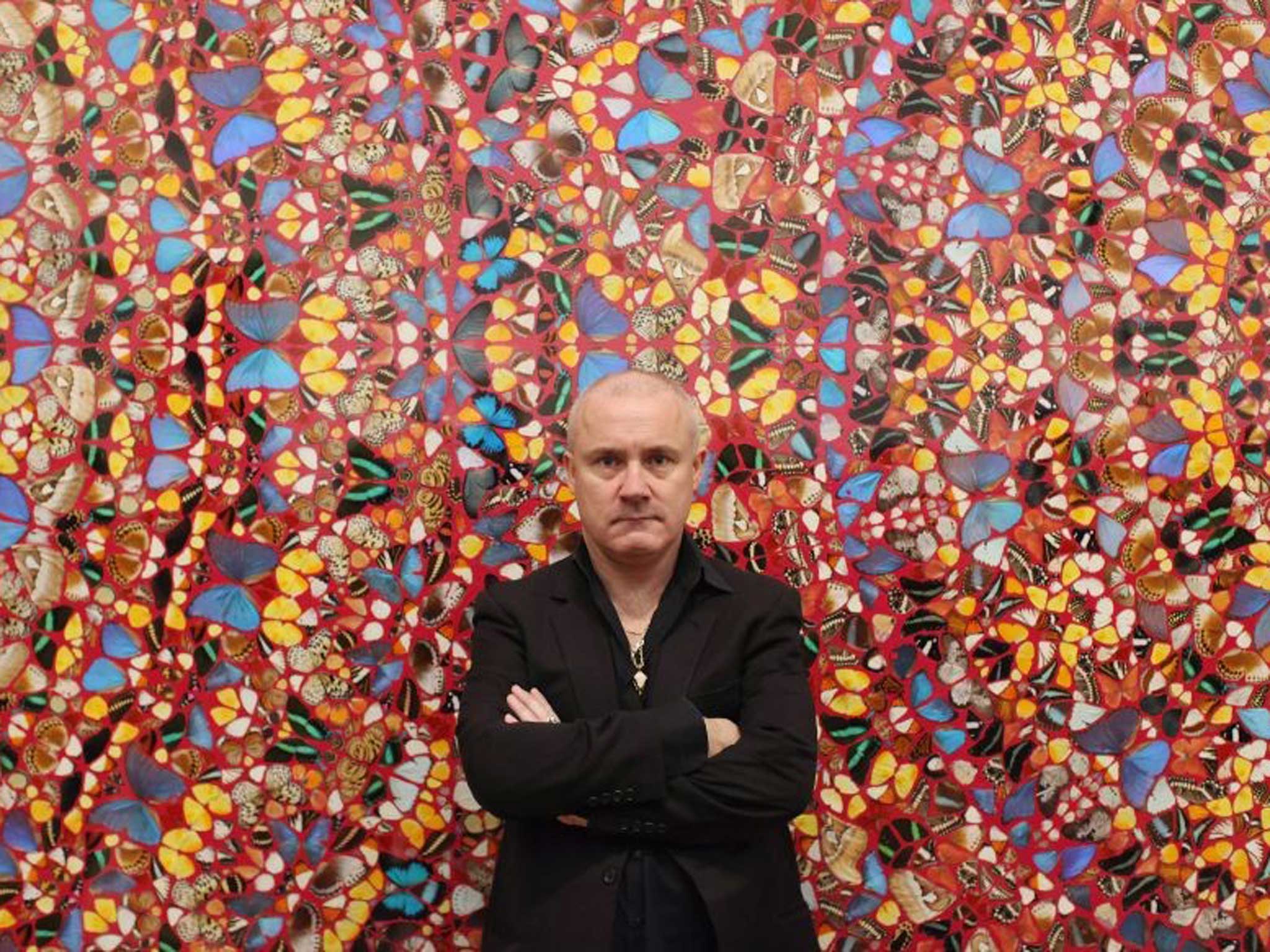 Different strokes: Damien Hirst poses in front of his artwork ‘I Am Become Death, Shatterer of Worlds’. He is hoping Ronnie O’Sullivan will not be having butterflies of his own this weekend