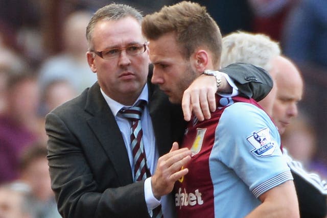 Aston Villa manager Paul Lambert congratulates goalscorer Andreas Weimann