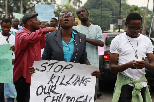 Demonstrators in Lagos call on the government to rescue the schoolgirls abducted by militants
