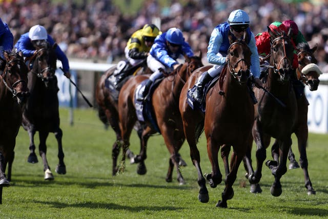Miss France, ridden by Maxime Guyon, wins the 1,000 Guineas at Newmarket