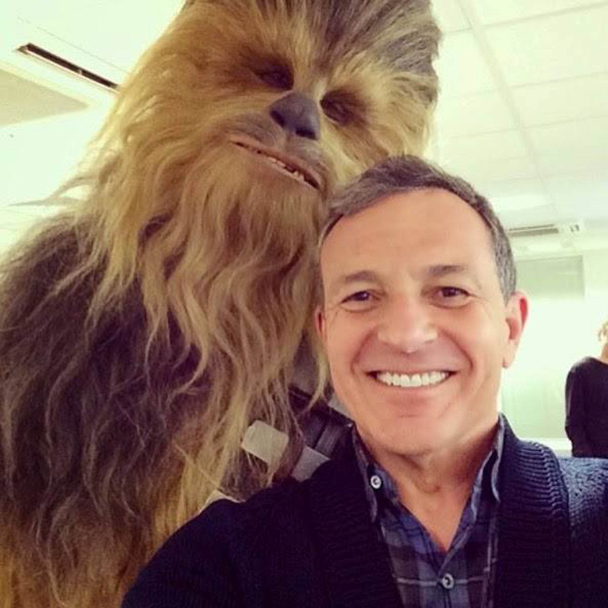 Bob Iger poses with Chewbacca to mark Star Wars Day