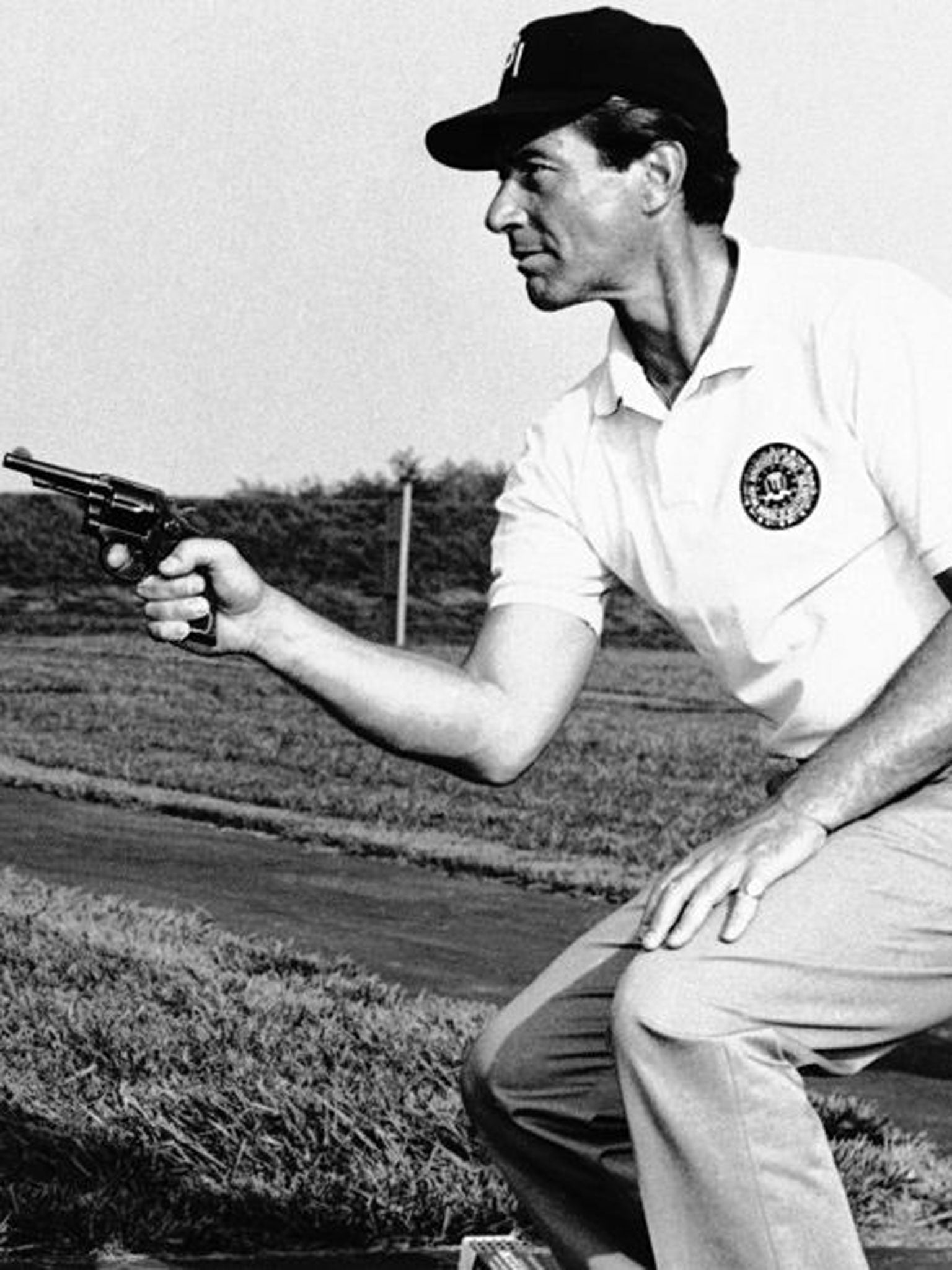 Zimbalist Jr in 1965 during a pistol training session given by the real FBI