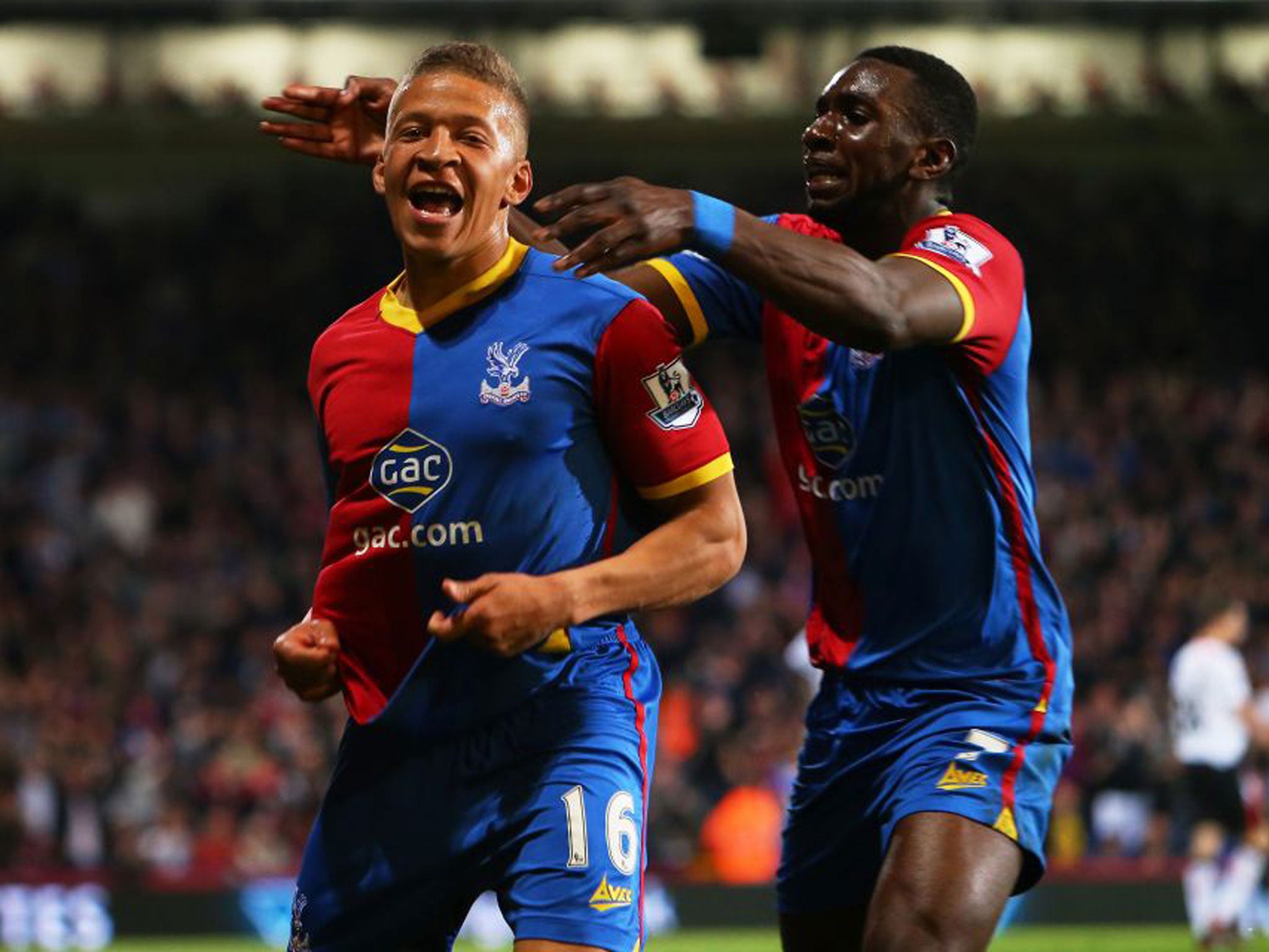 Dwight Gayle, left, celebrates after completing Crystal Palace’s amazing comeback