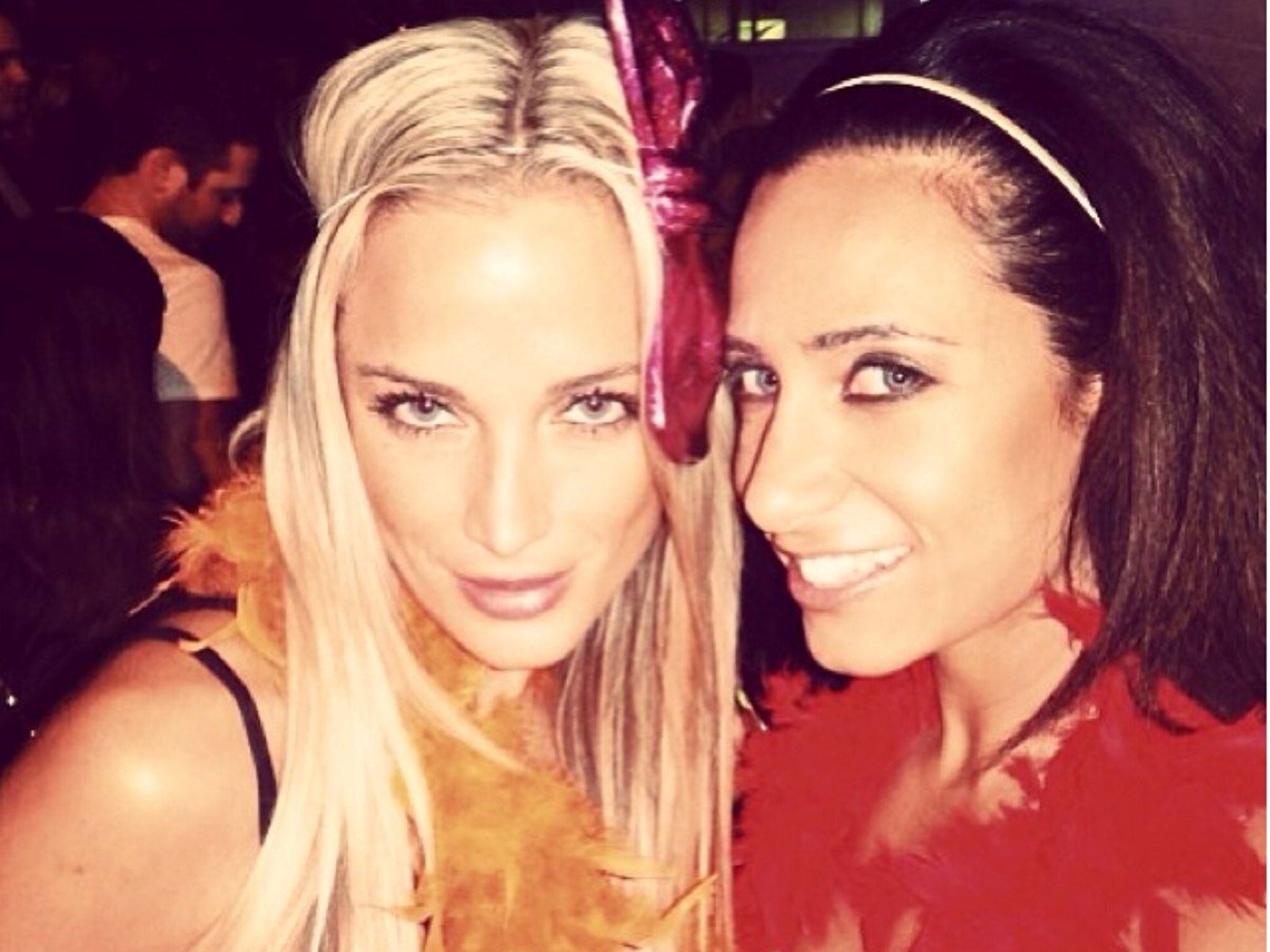 Reeva Steenkamp and friend Kim Myers at a party