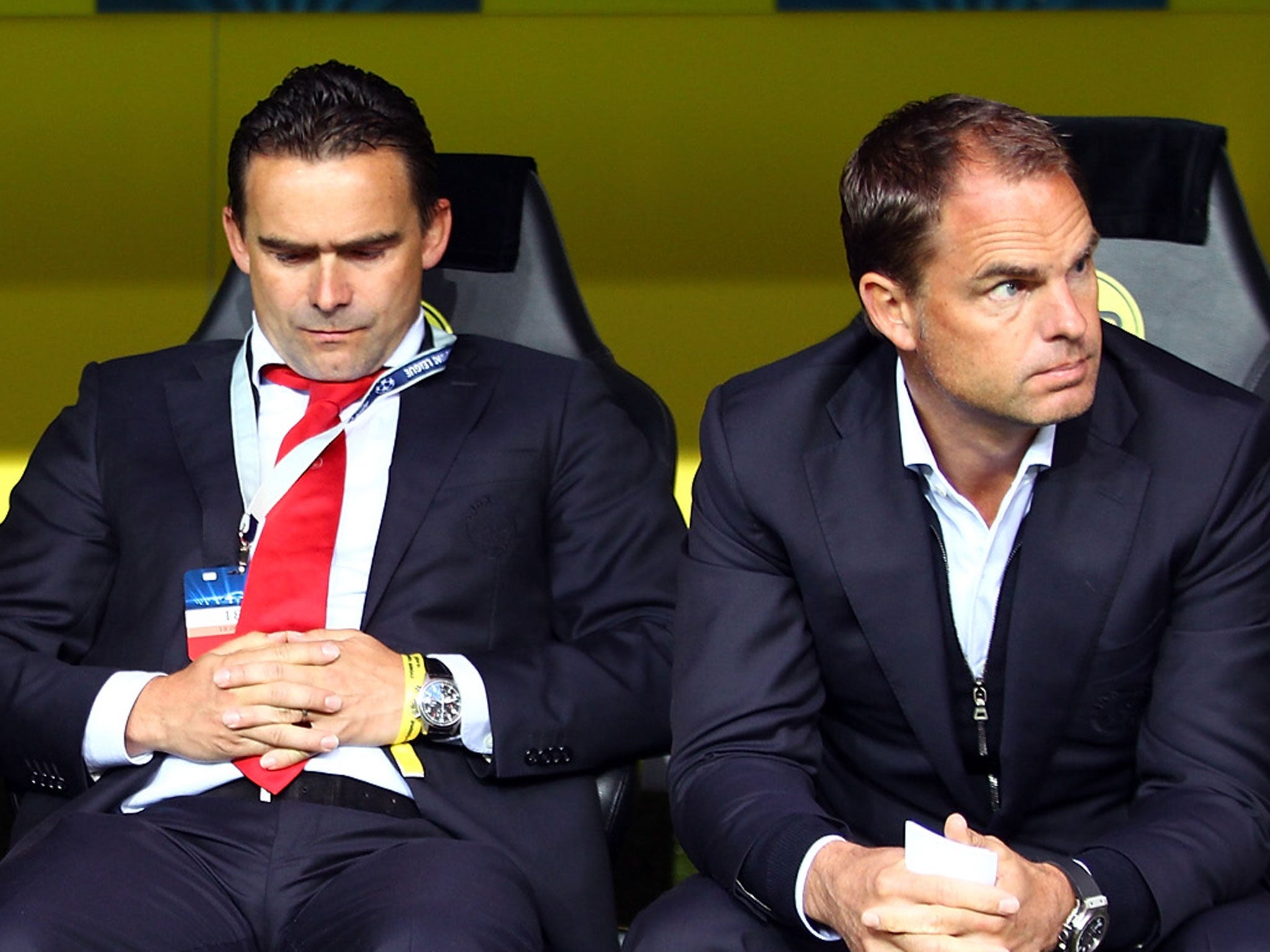 Marc Overmars (left) and Frank de Boer look on from the Ajax dugout