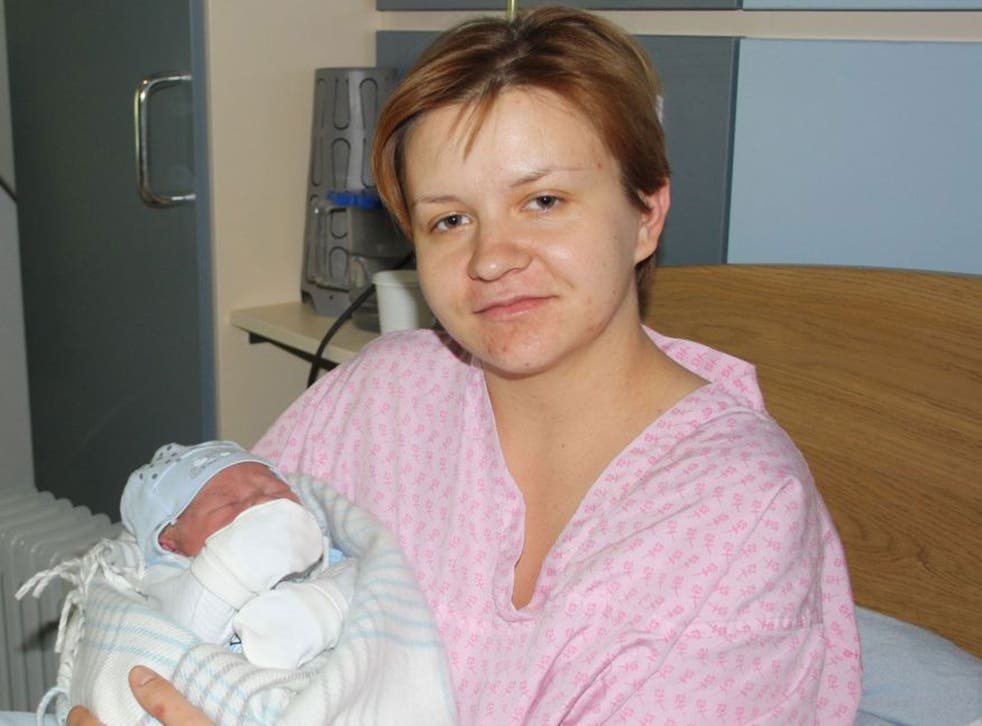 Ewelina Zimnicka and her new baby boy Antoni as London Fire Brigade firefighters Ross McLaren and Richie Hall helped to deliver him at the scene of an incident they were attending in Enfield, north London last night. PRESS ASSOCIATION Photo. Issue date: W