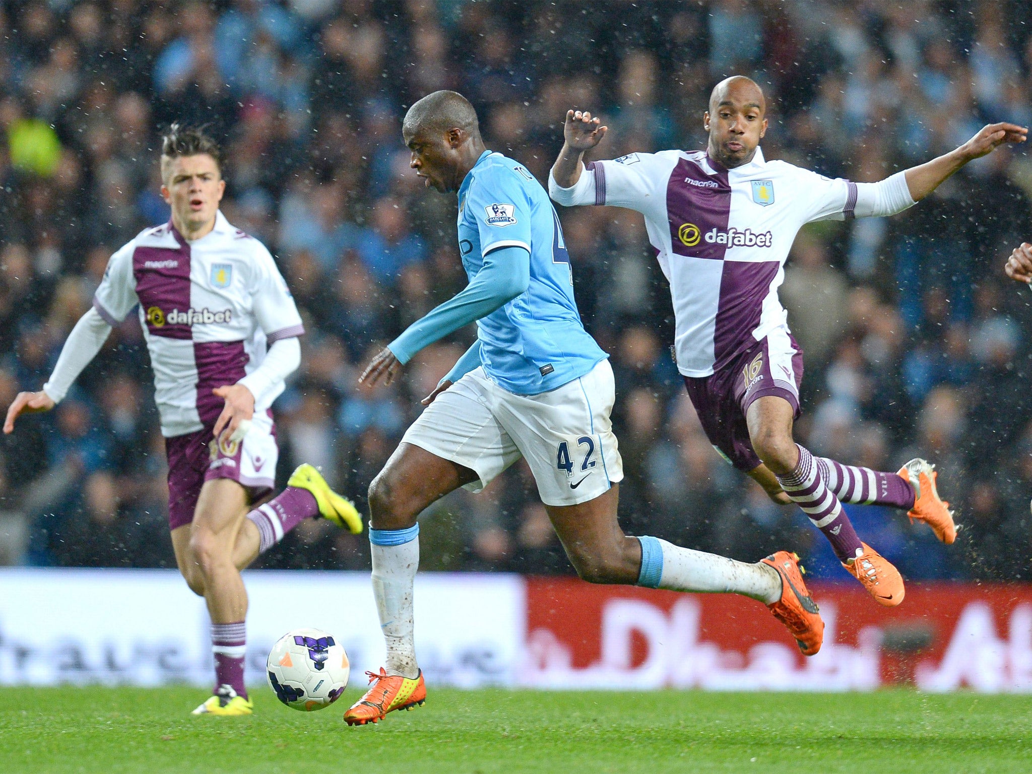 Yaya Touré leaves behind two Villa players on his way to scoring a stunning fourth goal for City (Getty)