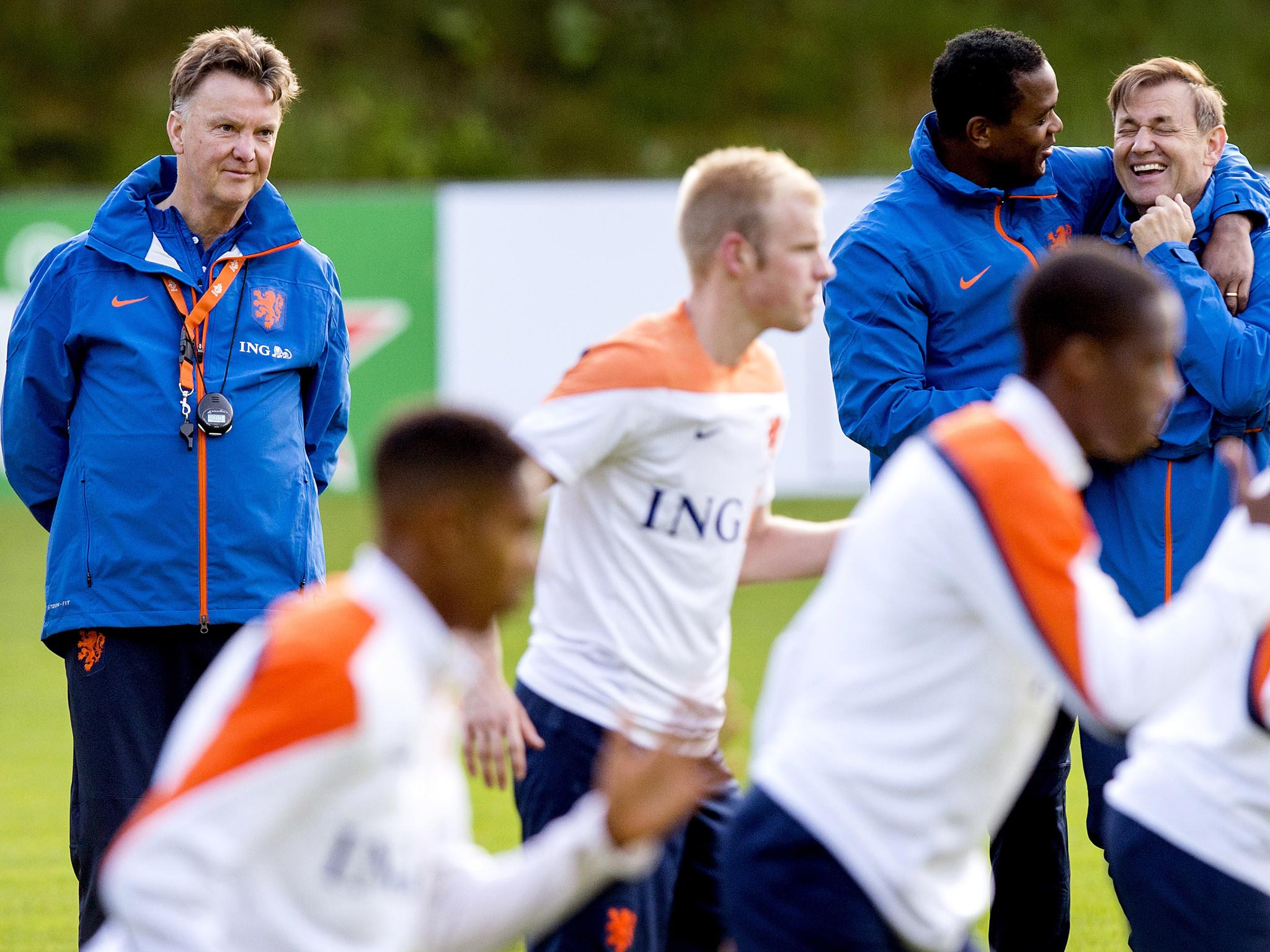 Louis van Gaal looks on as he leads training for his Netherlands side, who appear in good spirits ahead of his announcement of their 23-man squad for the World Cup