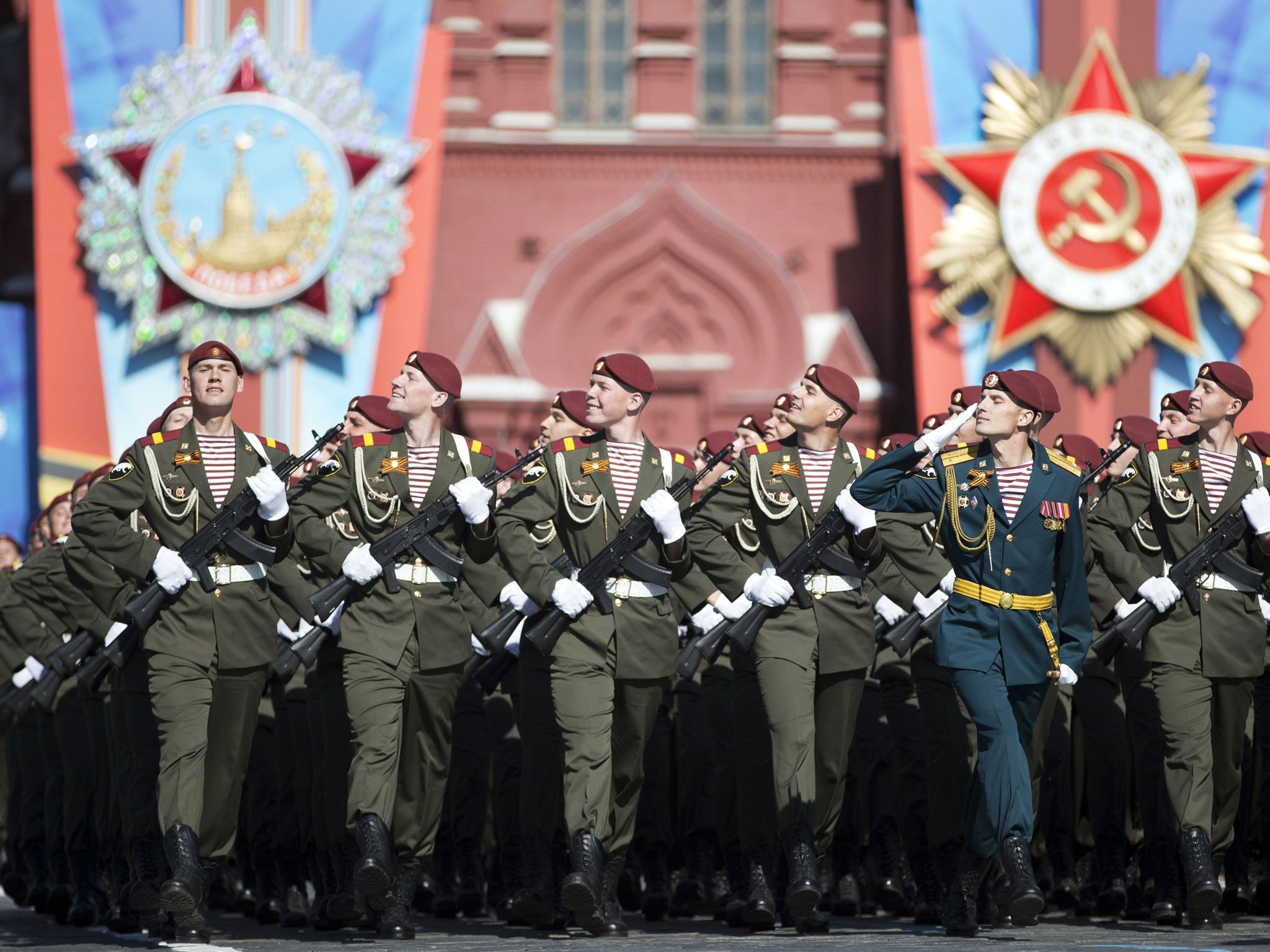Thousands of Russian troops marched on Red Square in the annual Victory Day parade in a proud display of the nation's military might amid escalating tensions over Ukraine