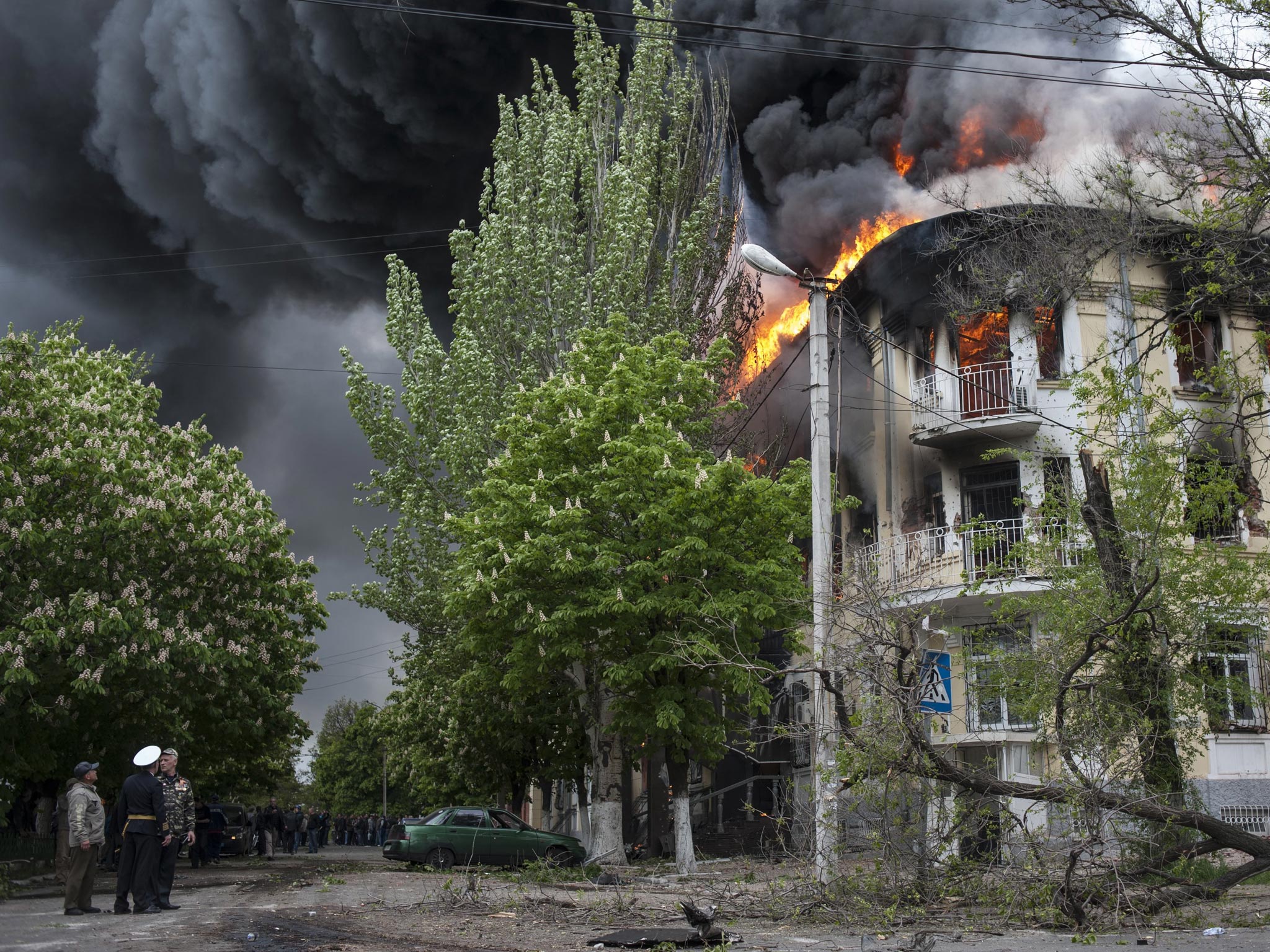 A police station is ablaze in Mariupol, eastern Ukraine