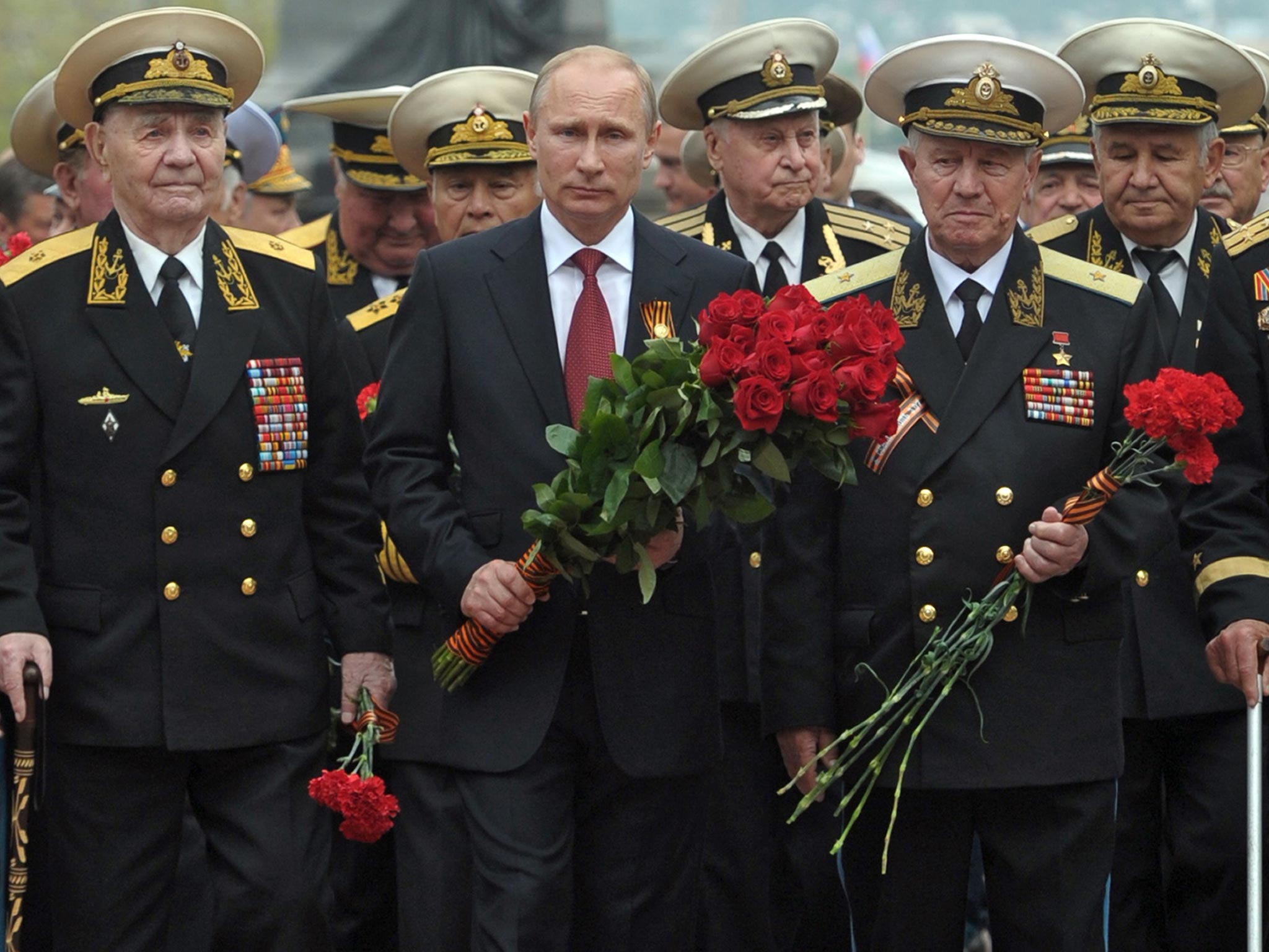 Vladimir Putin with Second World War veterans in Sevastopol yesterday