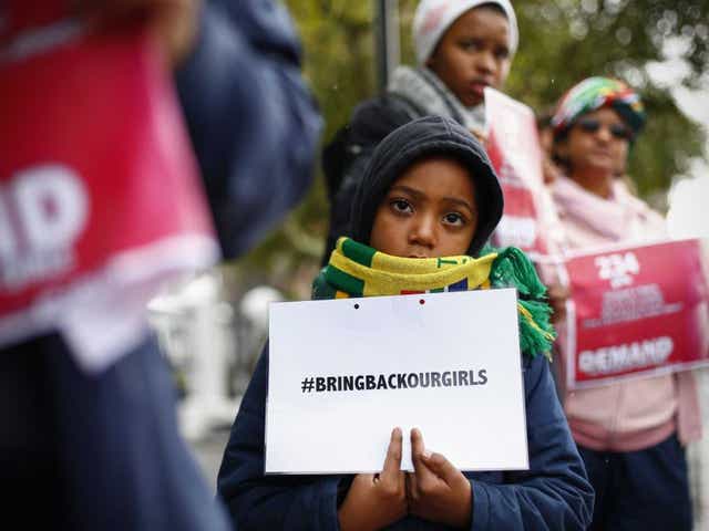 Global anger: Protesters in Cape Town yesterday join a global Twitter campaign to bring pressure to bear to secure the release of  the Nigerian girls 
