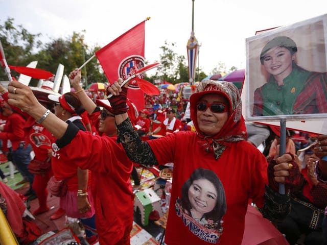 Pro-government ‘red shirts’ in Bangkok yesterday 
