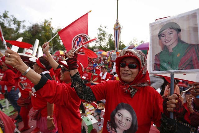 Pro-government ‘red shirts’ in Bangkok yesterday 