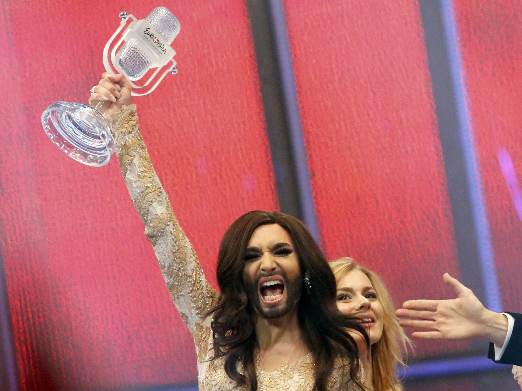 Conchita Wurst representing Austria celebrates after winning the grand final of the 59th Eurovision Song Contest