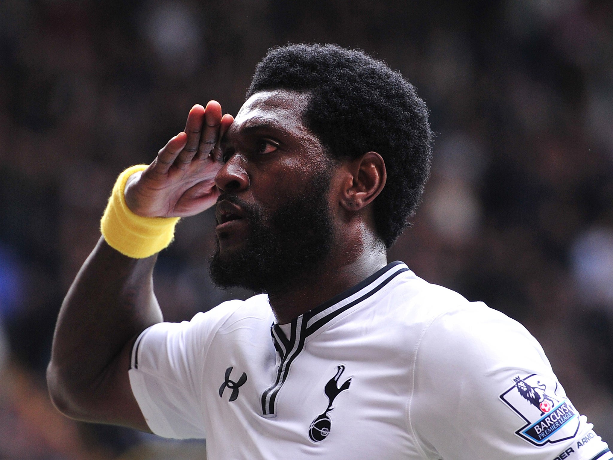 Emmanuel Adebayor salutes the crowd after scoring for Tottenham