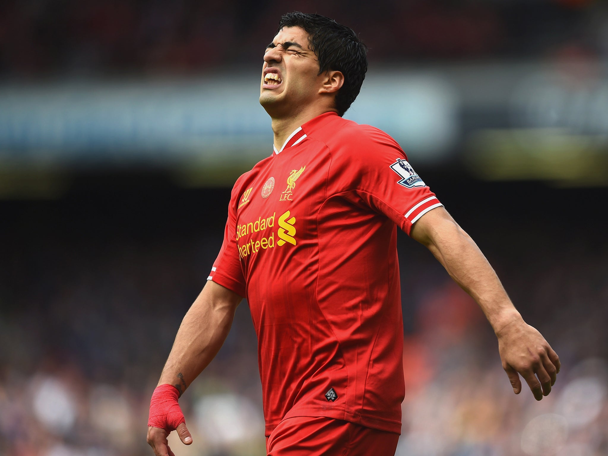 Luis Suarez can't believe it as his goal is disallowed