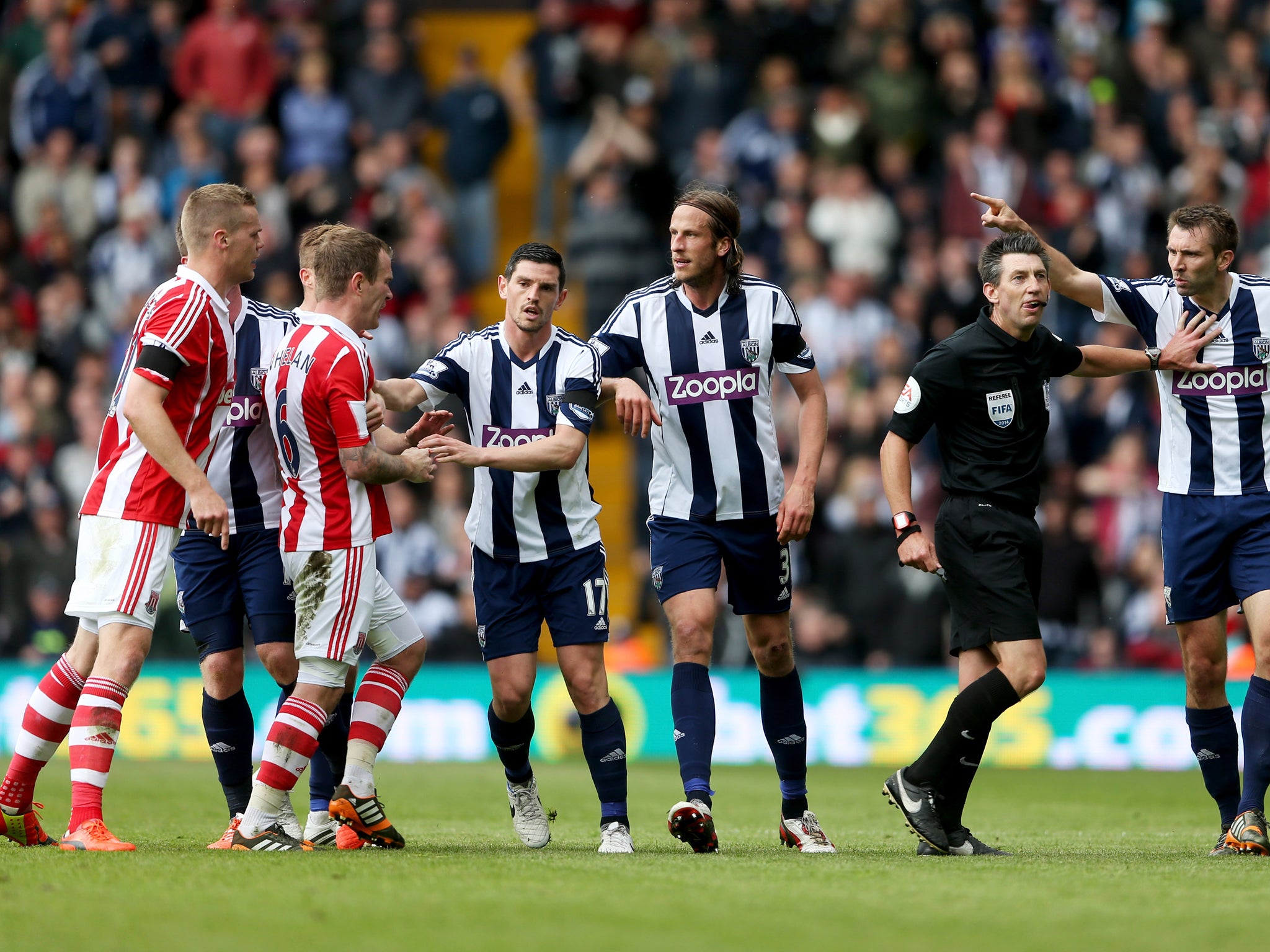 Stoke and West Brom players clash