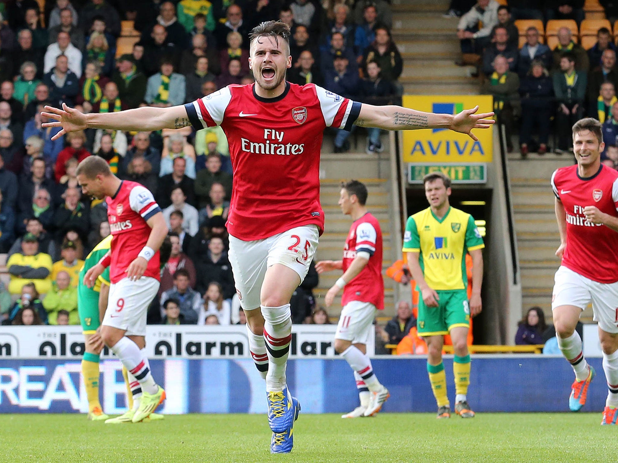 Carl Jenkinson celebrates scoring the away side's second, his first goal for the club